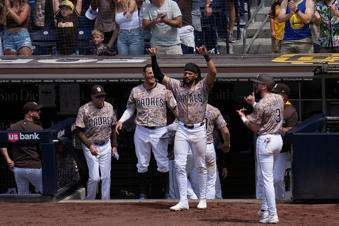 &nbsp;San Diego Padres right fielder Fernando Tatis Jr., center, celebrates with teammates after Jose Iglesias hit a two-RBI single during the seventh inning of a baseball game against the Kansas City Royals Sunday, June 22, 2025, in San Diego. (AP Photo/Gregory Bull)