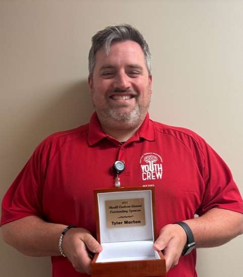 Tyler Morton, Juvenile Services prevention advocate, earns Outstanding Sponsor of the Year award.