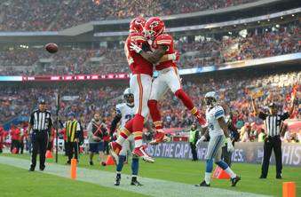 FILE - Kansas City Chiefs wide receiver De'Anthony Thomas (13), right, celebrates after scoring a touchdown during the NFL football game between Detroit Lions and Kansas City Chiefs at the Wembley Stadium in London, England, Sunday, Nov. 1, 2015. (AP Photo/Tim Ireland, File)