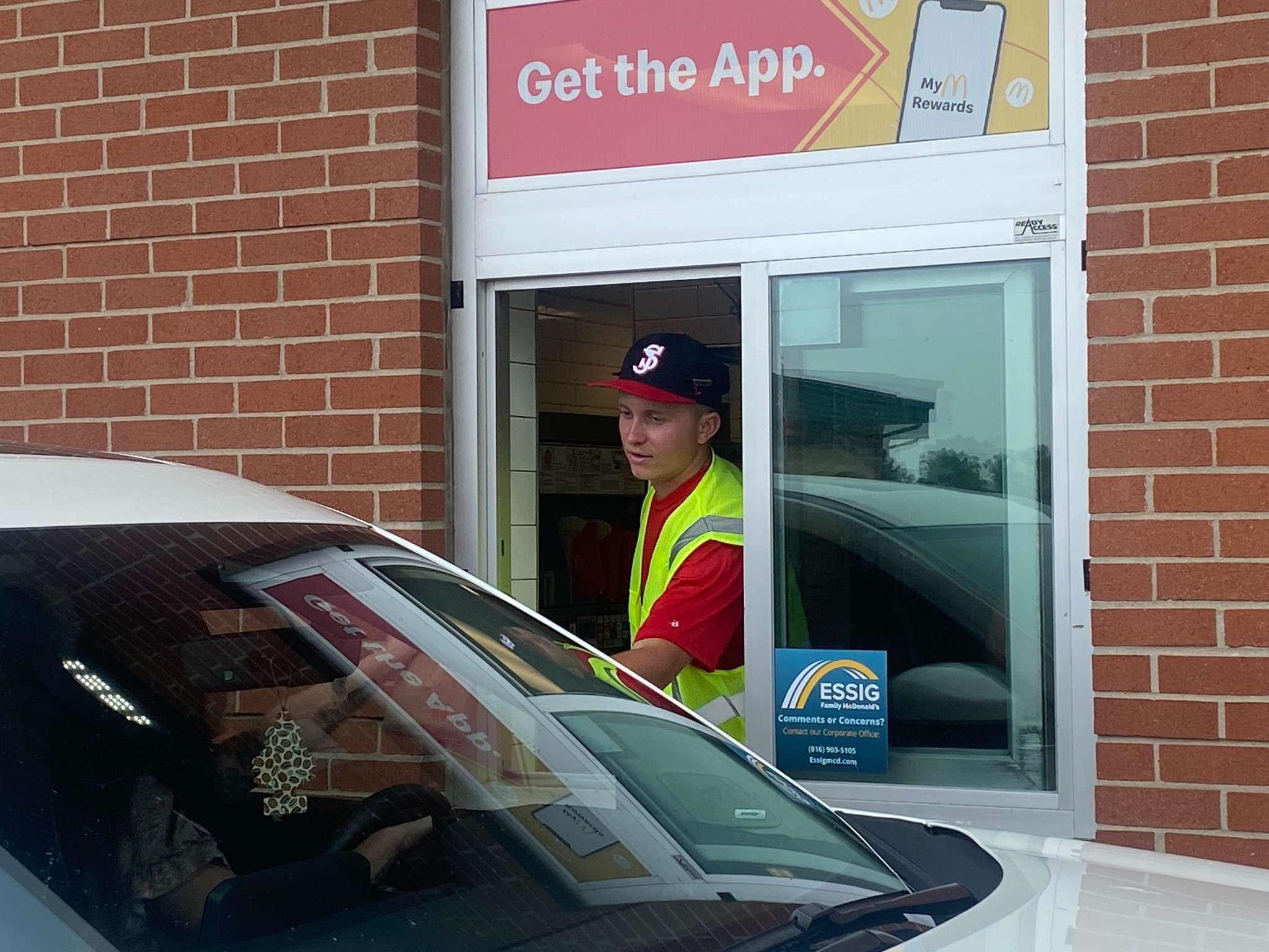 Lafayette alum and Mustangs player Brayden Luikart serves from the drive thru during an event benefiting the United Way of Greater St. Joseph in 2023.&nbsp; The Mustangs and the Essig Family McDonalds are teaming up again today to benefit United Way, with a portion of sales going to the 2025 United Way campaign/ Photo courtesy of United Way of Greater St. Joseph
