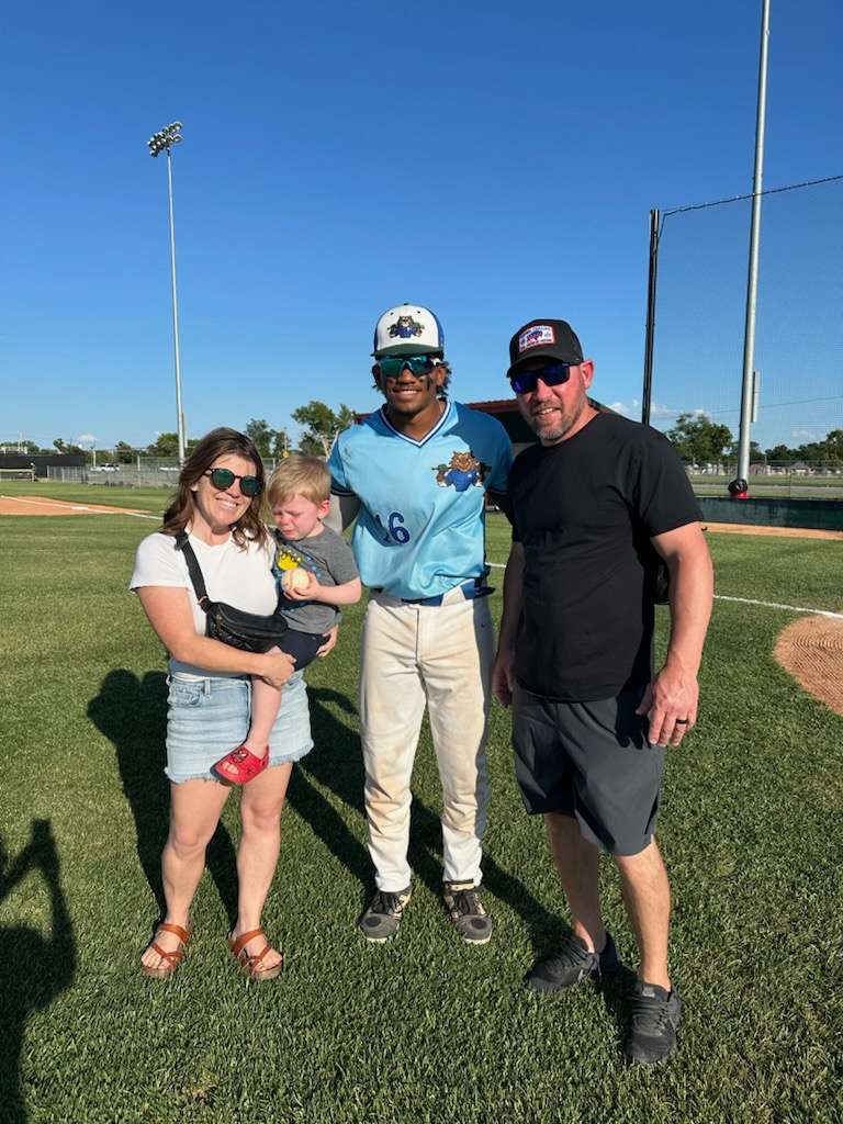 Eagle Media's Shannon Towns' (left) son threw out the first pitch during Wednesday's Great Bend Bat Cats game at Al Burns Field. Along with Eagle Media night at the ballfield, the Bat Cats secured a 14-2 win over Dodge City.<br><br>Great Bend faces Kingman Thursday, June 26 at 7 p.m.