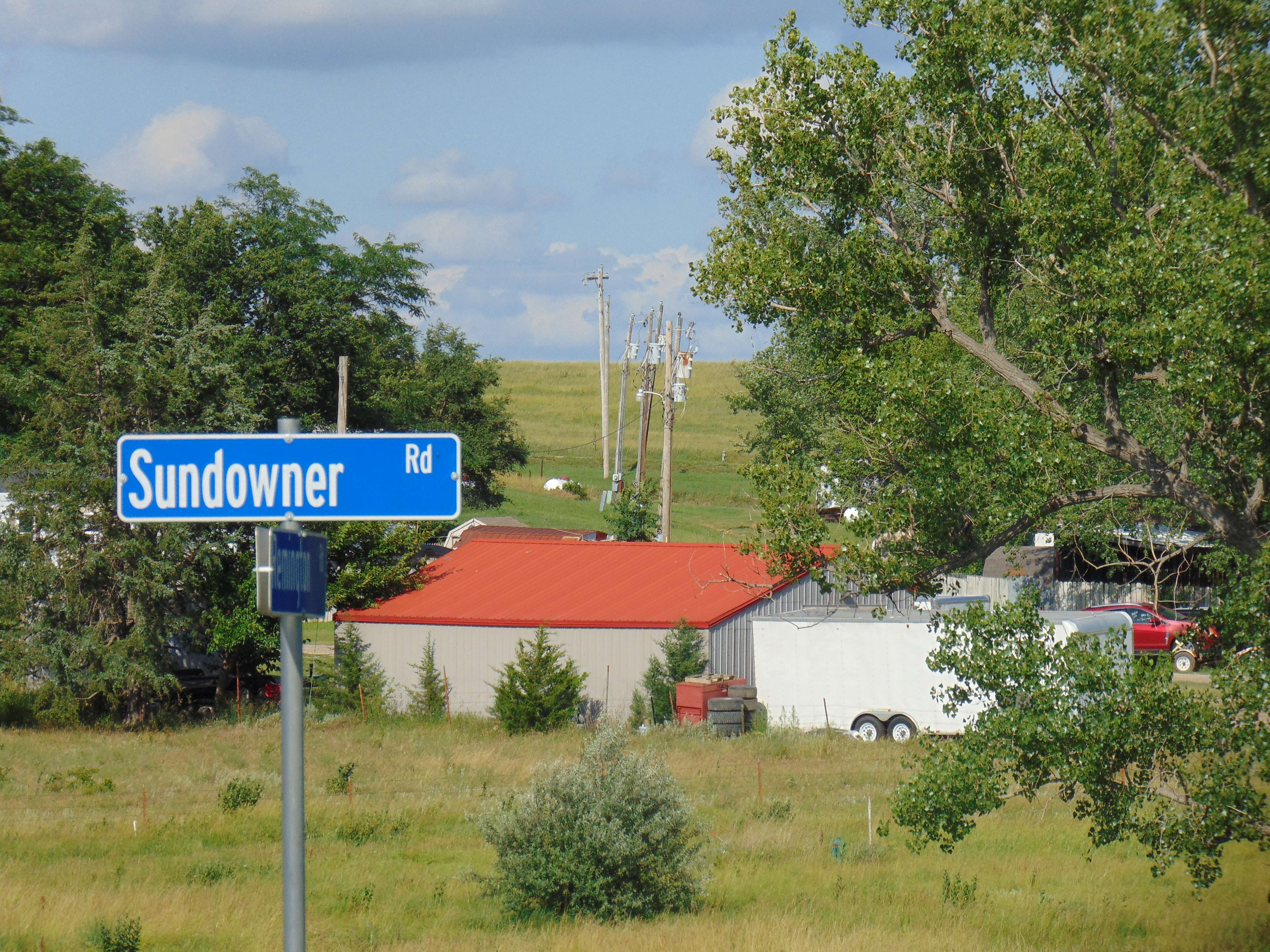 Sundowner Rd. street post near Hedville in rural Saline County where the Sundowner West Mobile Home Park is located. Photo by Nicolas Fierro