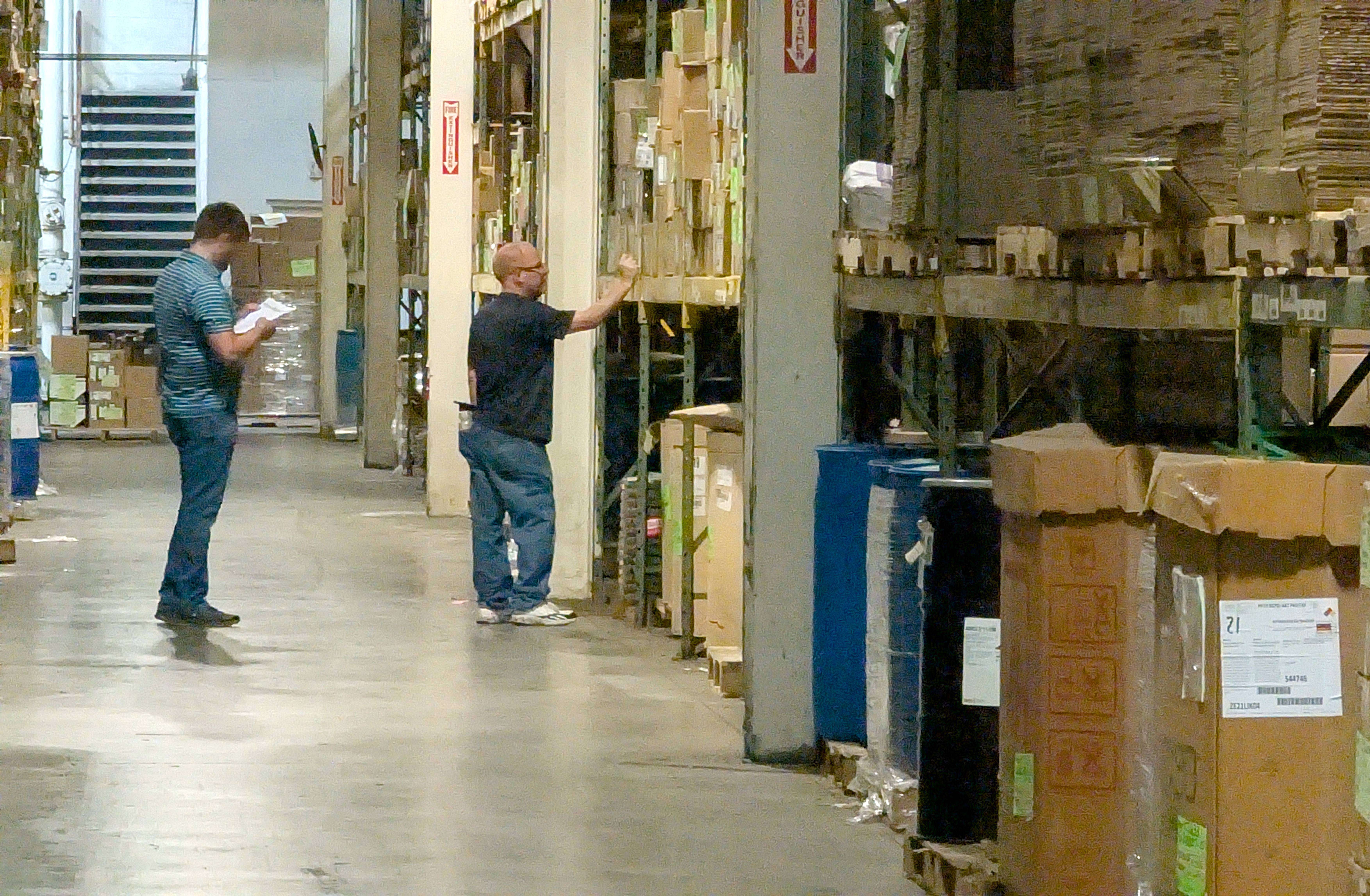 Fuller Industries Inc Supply Chain Vice President Cory Sager and Procurement Specialist Cory Starr take inventory of items in the company’s sprawling raw materials warehouse Tuesday afternoon.