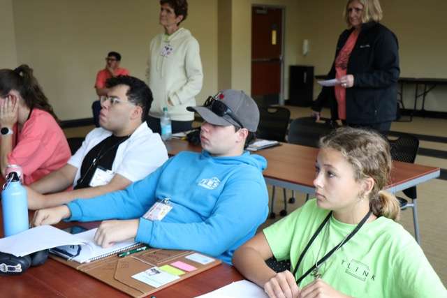 From left to right: Damian Palma, recent Great Bend High School graduate; Jamesray Short, GBHS junior; and Mya Brewer, eighth grader at Hoisington Middle School participate in a peer-led breakout session at the recent Upstream Kansas training at Wichita.