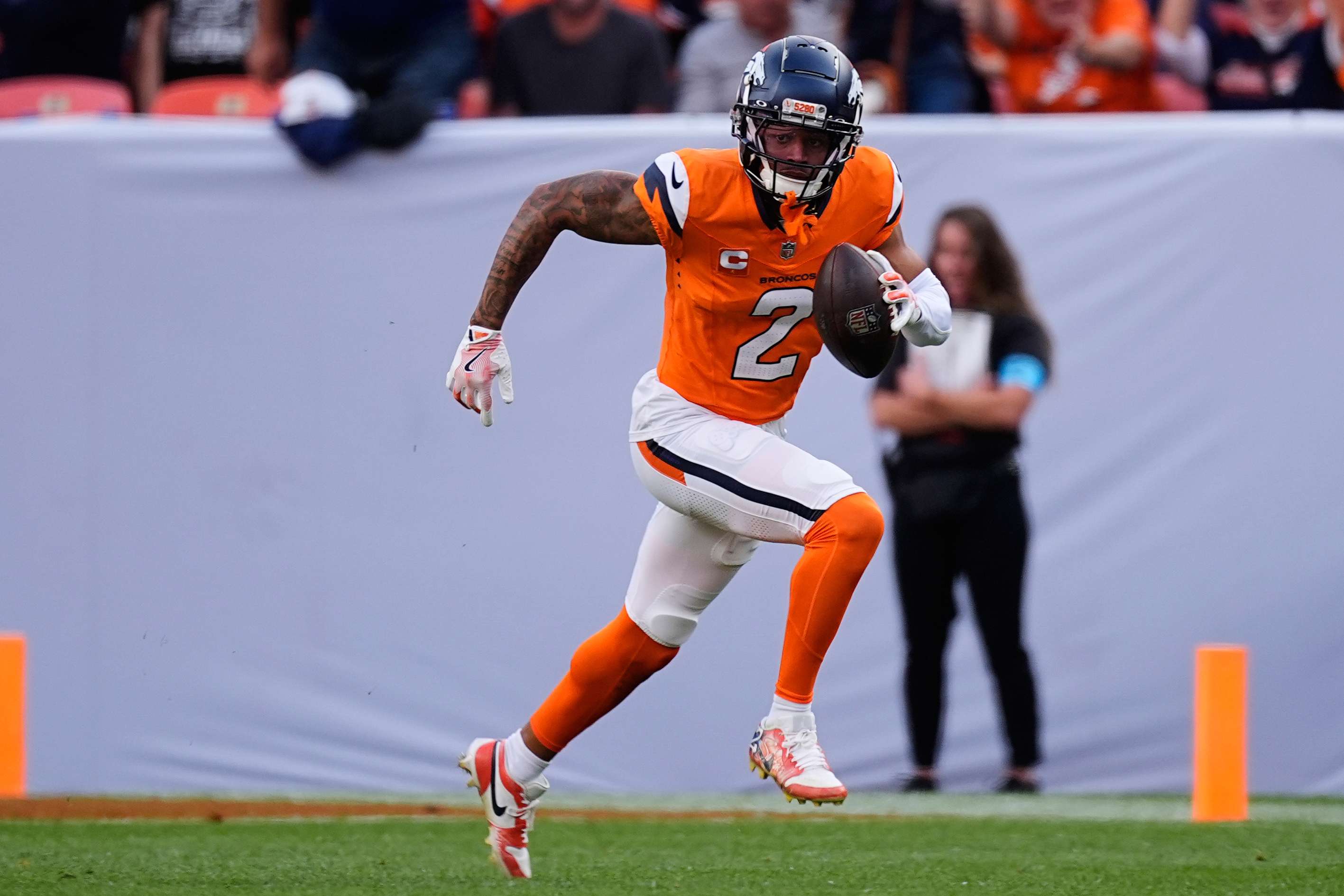 FILE - Denver Broncos cornerback Pat Surtain II (2) returns interception during the second half of an NFL football game, Sunday, Oct. 27, 2024, in Denver. (AP Photo/David Zalubowski, File)