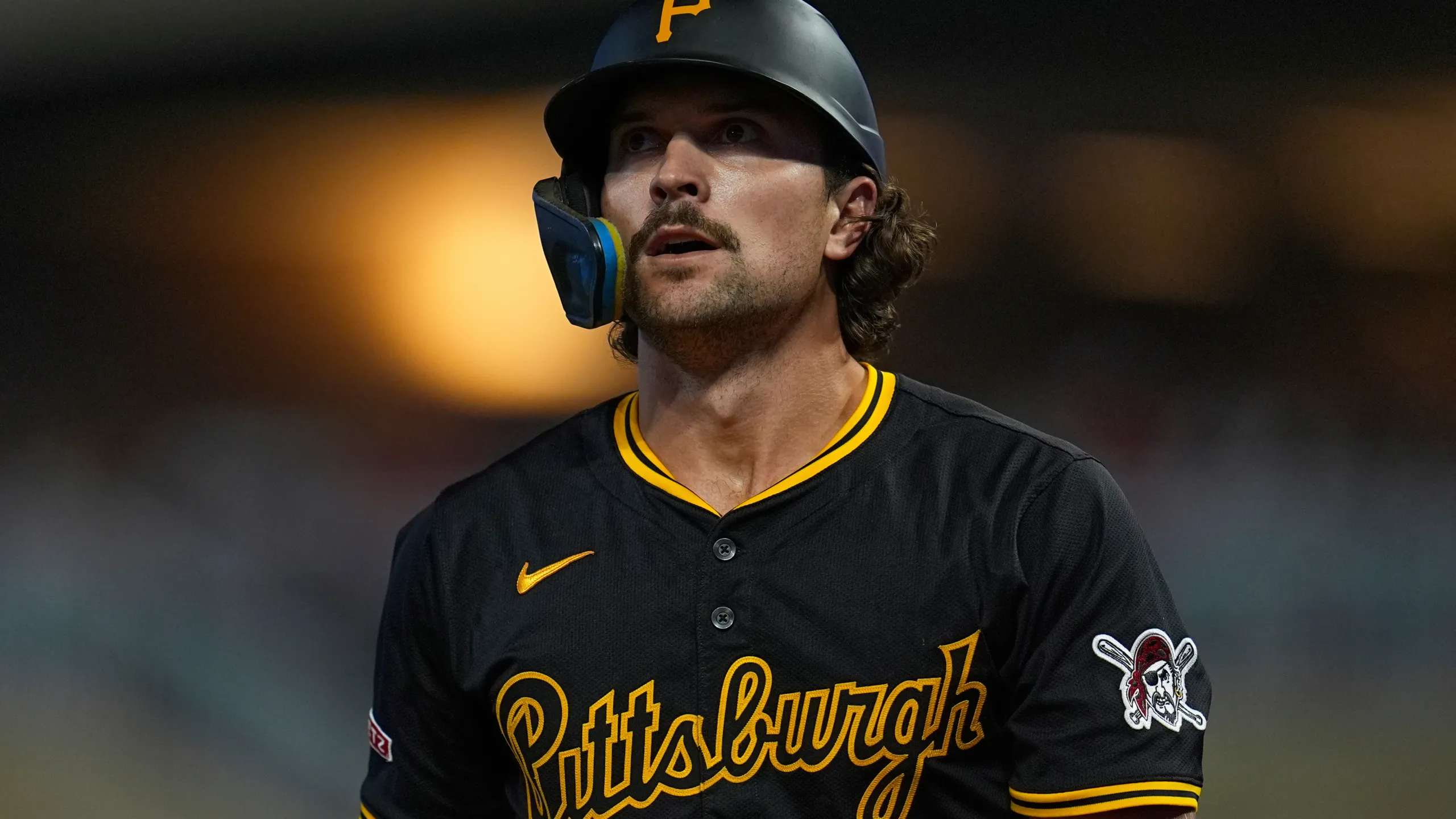 Pittsburgh Pirates' Adam Frazier walks back to the dugout after striking out during the ninth inning of a baseball game against the Minnesota Twins, Friday, July 11, 2025, in Minneapolis. (AP Photo/Abbie Parr)