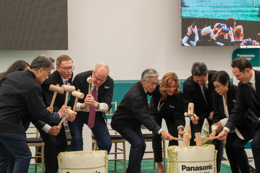 Officials from Kansas and Japan participate in a traditional ceremony, involving mallets and casks of sake, to celebrate the grand opening of Japanese tech giant Panasonic's battery plant in De Soto. Photo by Zane Irwin/Kansas News Service