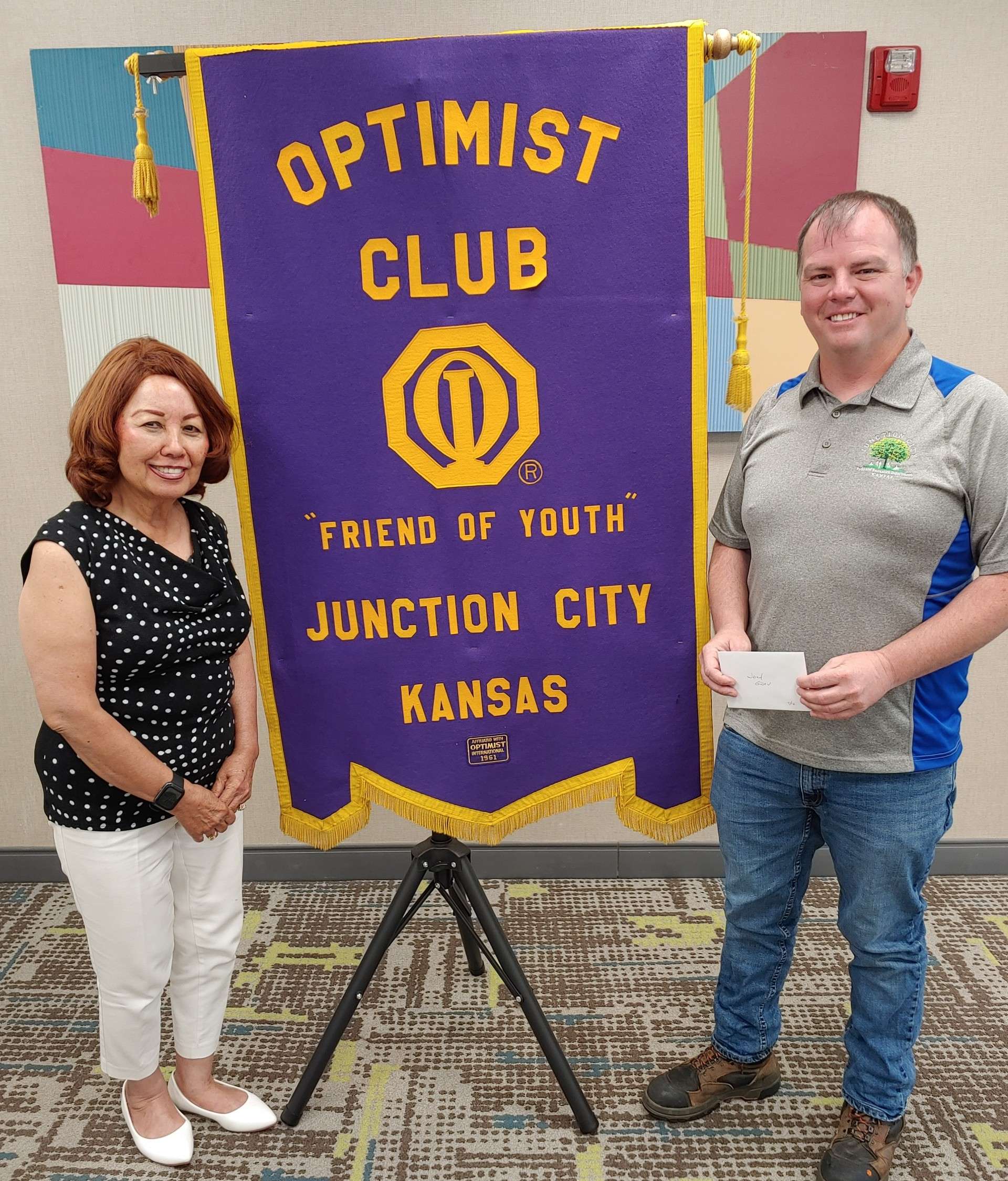 Pictured left to right: Nita Miller, JC Breakfast Optimist Club President and Josh Gray, Junction City Parks and Rec Director
