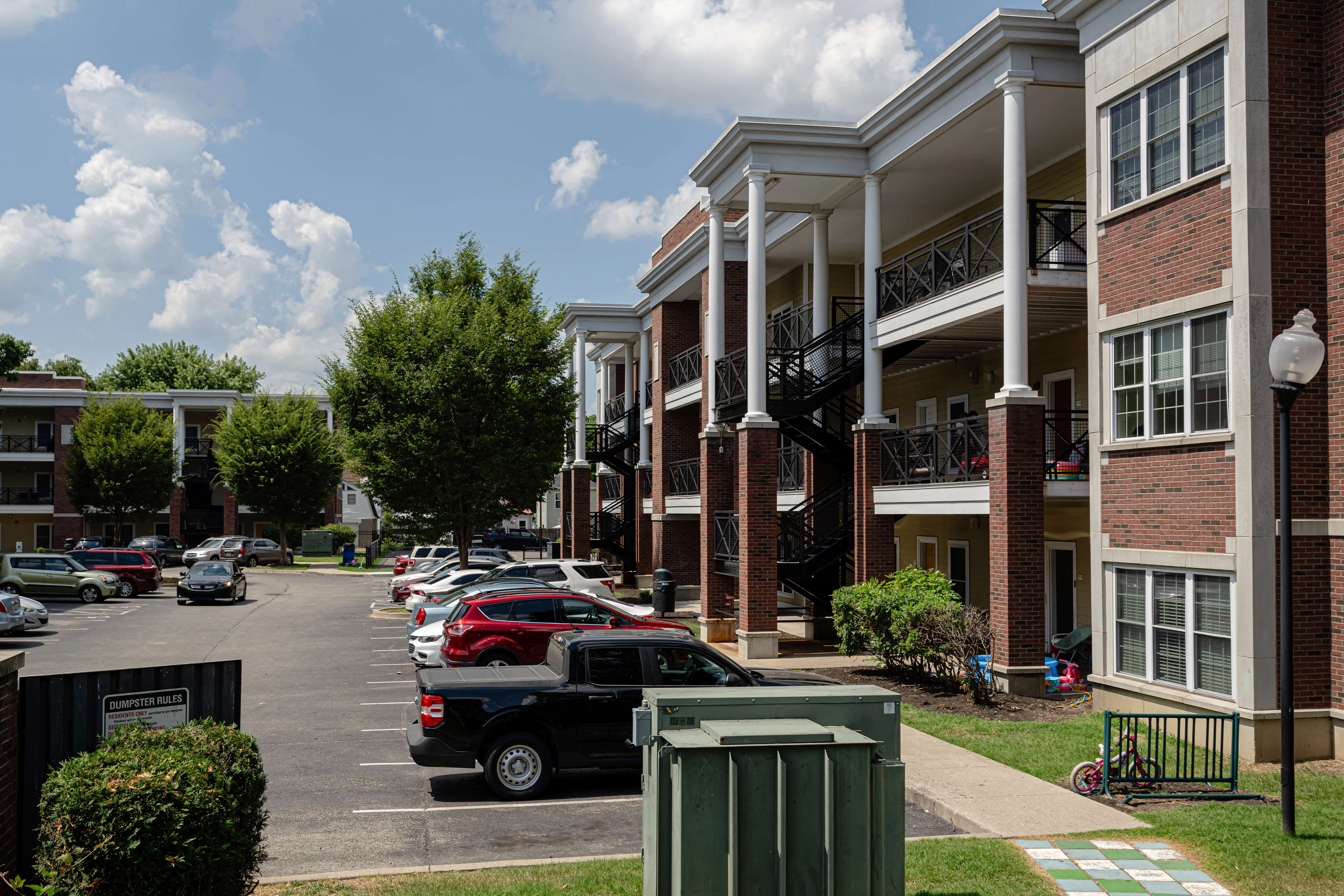 Apartment buildings are seen at the Stoddard Johnston Scholar House, Friday, July 11, 2025, in Louisville, Ky. (AP Photo/Jon Cherry)