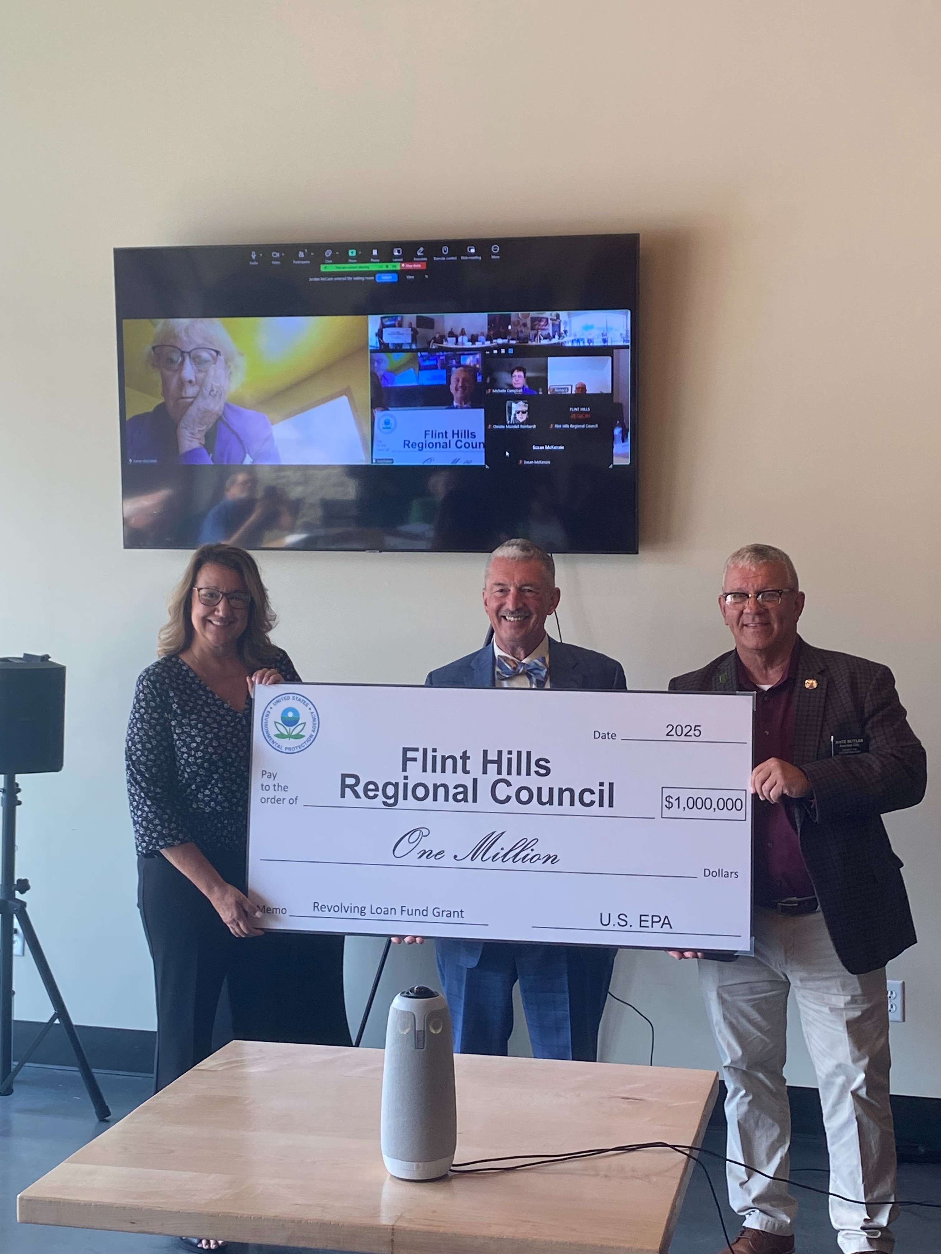 Flint Hills Regional Council Check Presentation - (Left to right) - Trish Giordano - (President of Flint Hills Regional Council), Jim Macy - (EPA Region 7 Administrator), and Nate Butler - (State Representative District 68). The check presentation was done at Highwind Brewing in Junction City.