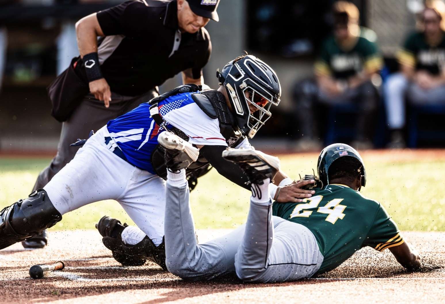 Exciting plays such as Hays Larks catcher Lorenzo Rios tagging out a runner at home plate are what fans have come to expect from Larks Magic over the years. Photo by Stenzel Film