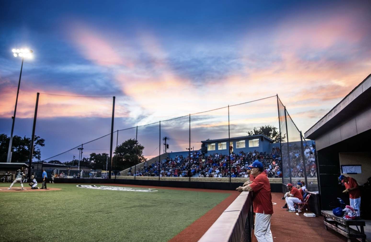 Larks Park is bathed in the setting sun during a game earlier this summer. Every home game in the grandstands are full of fans cheering on their favorite team. Photo by Stenzel Film