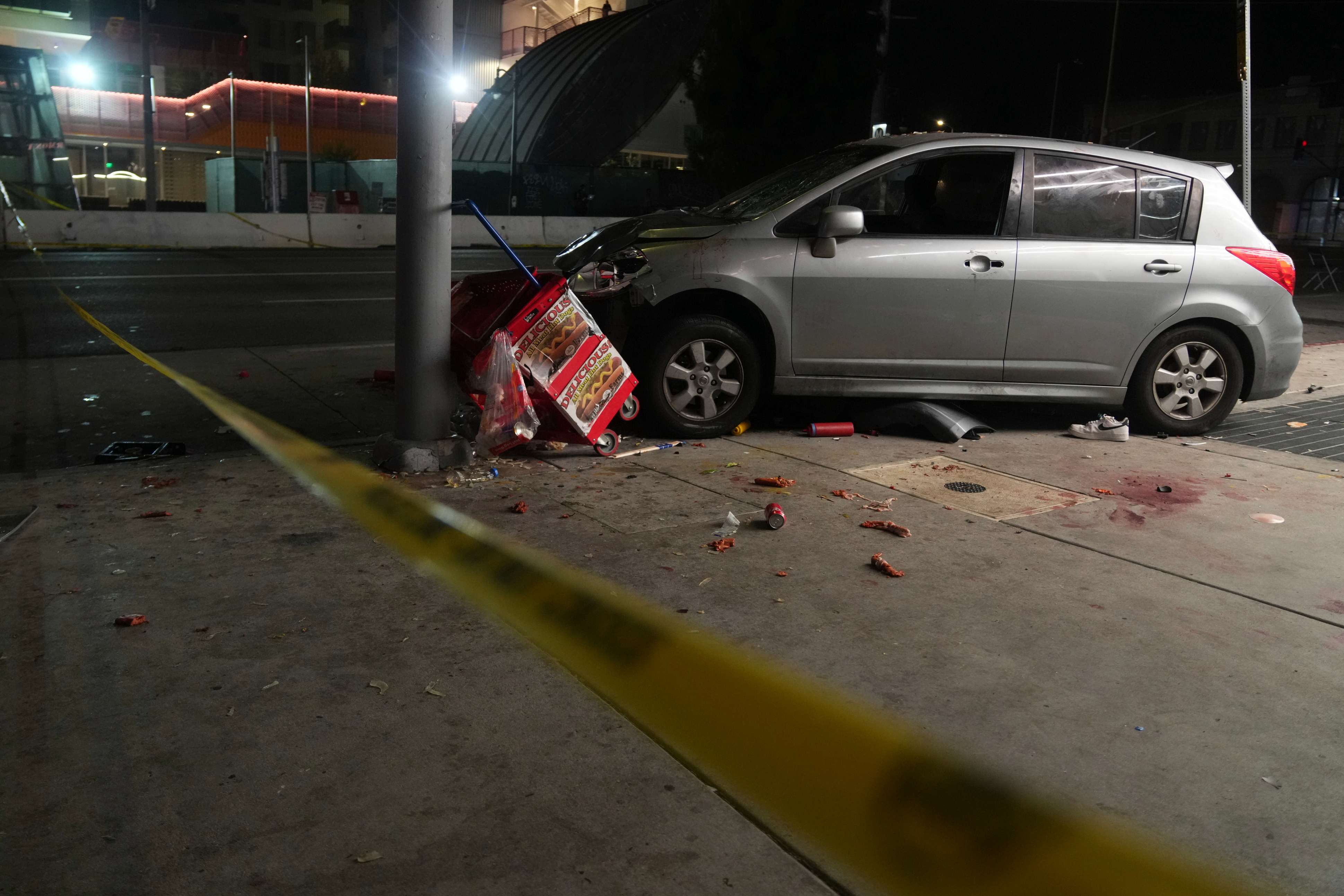 An area is roped off after a vehicle rammed into a crowd of people waiting to enter a nightclub along a busy boulevard in Los Angeles early Saturday, July 19, 2025, injuring several people. (AP Photo/Damian Dovarganes)
