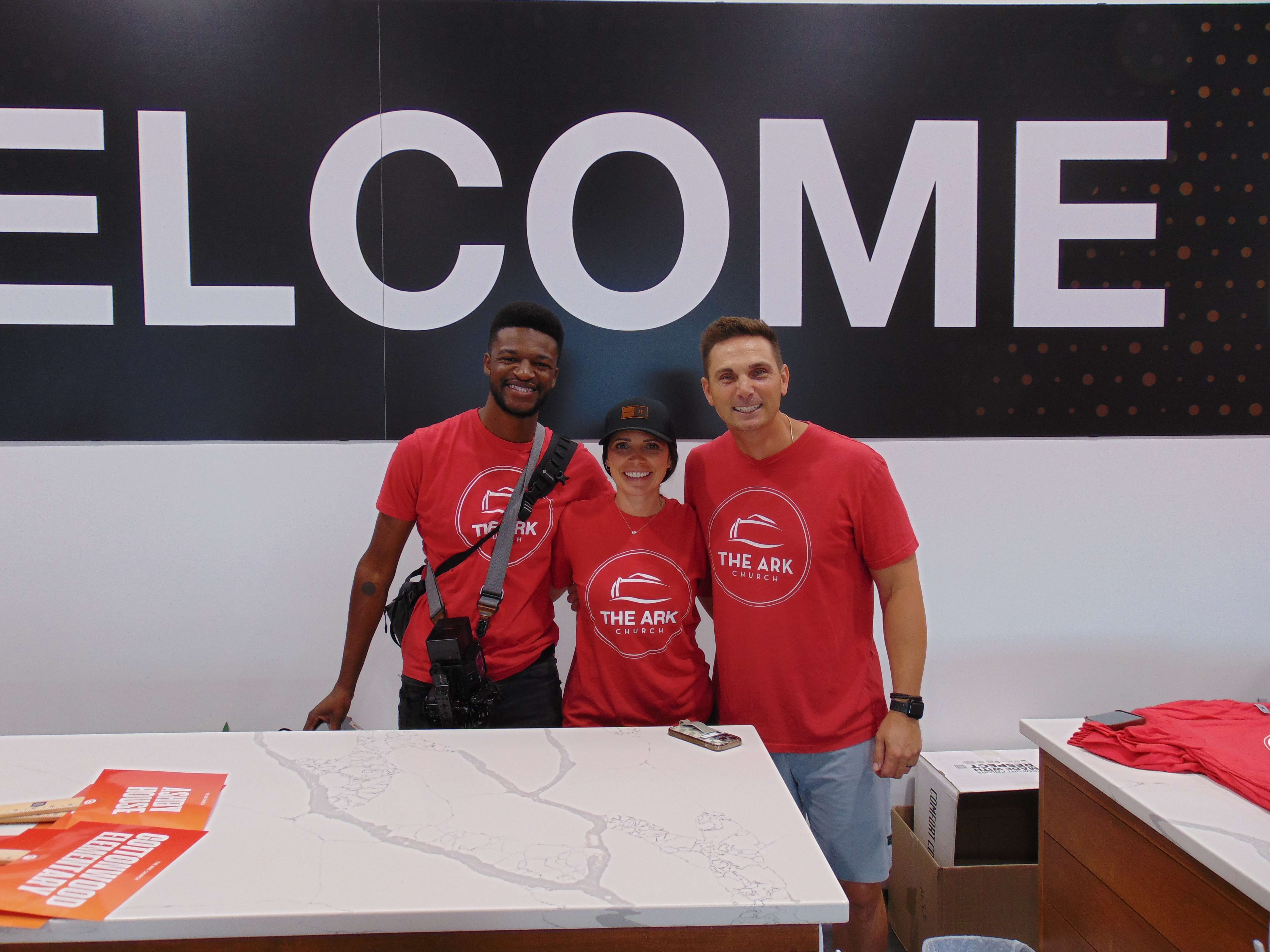 Members of the Ark Church ready for "Serve Day" on Saturday, July 19. (left) August Phlieger, (middle) Lindsay Huseman, (right) John Huseman; photo by Nicolas Fierro