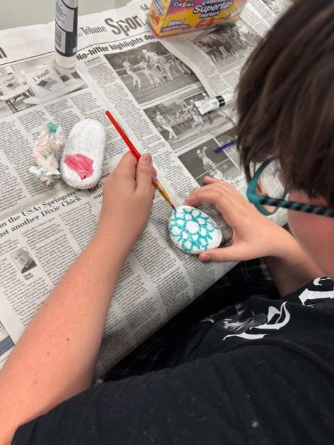 A local young person participates in the recent Kindness Rocks Project, part of a series of Life Skills classes for Juvenile Services clients.