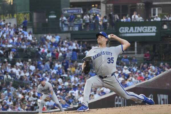 Kansas City Royals starting pitcher Rich Hill throws against the Chicago Cubs during the first inning of a baseball game in Chicago, Tuesday, July 22, 2025. (AP Photo/Nam Y. Huh)