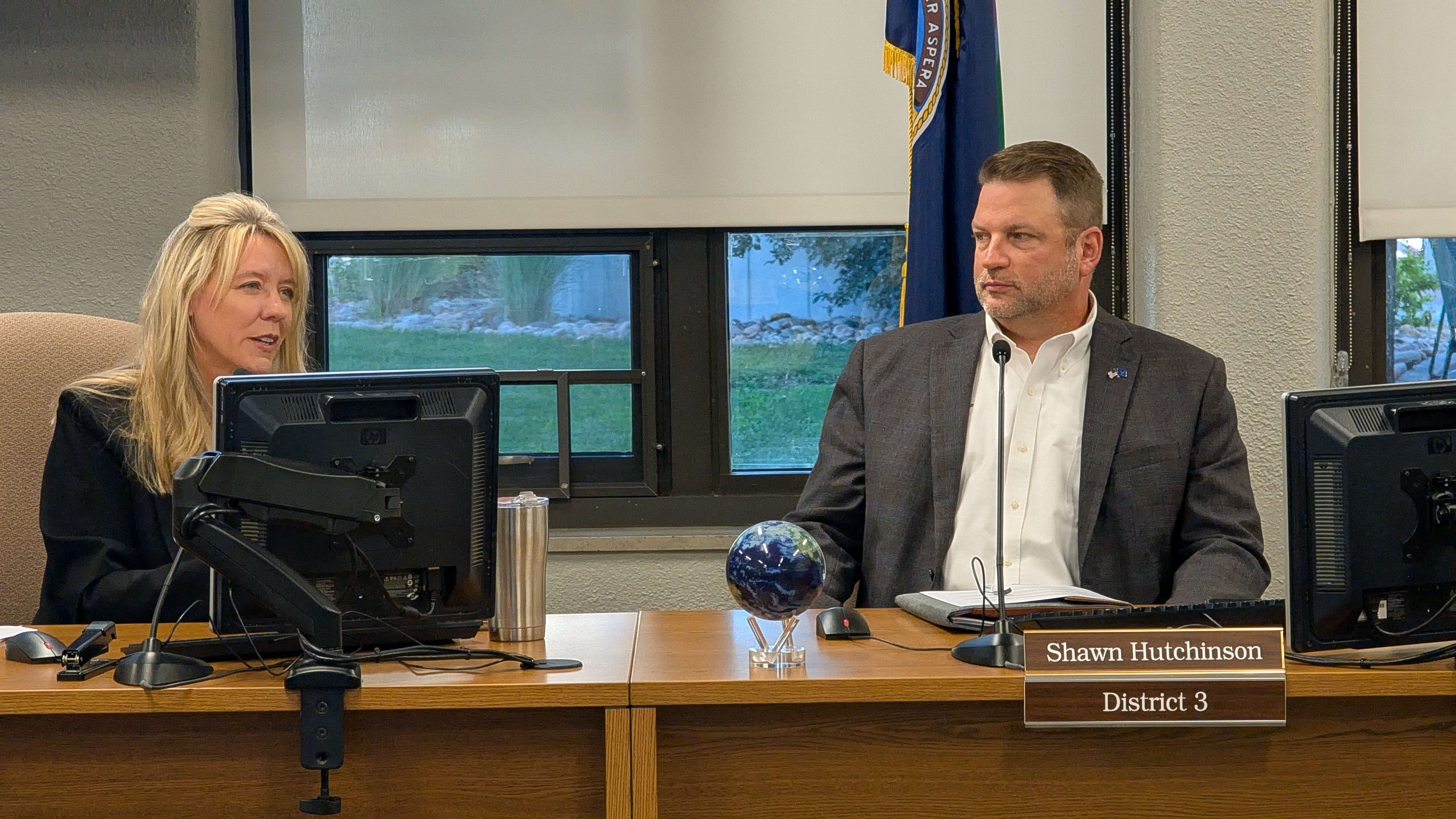 Barton County Commission Chair Tricia Schlessiger leads the commission Tuesday morning. Commissioners are going to take time in the afternoons following meetings this fall to visit taxpayers and businesses around the county. Also pictured is Commissioner Shawn Hutchinson.
