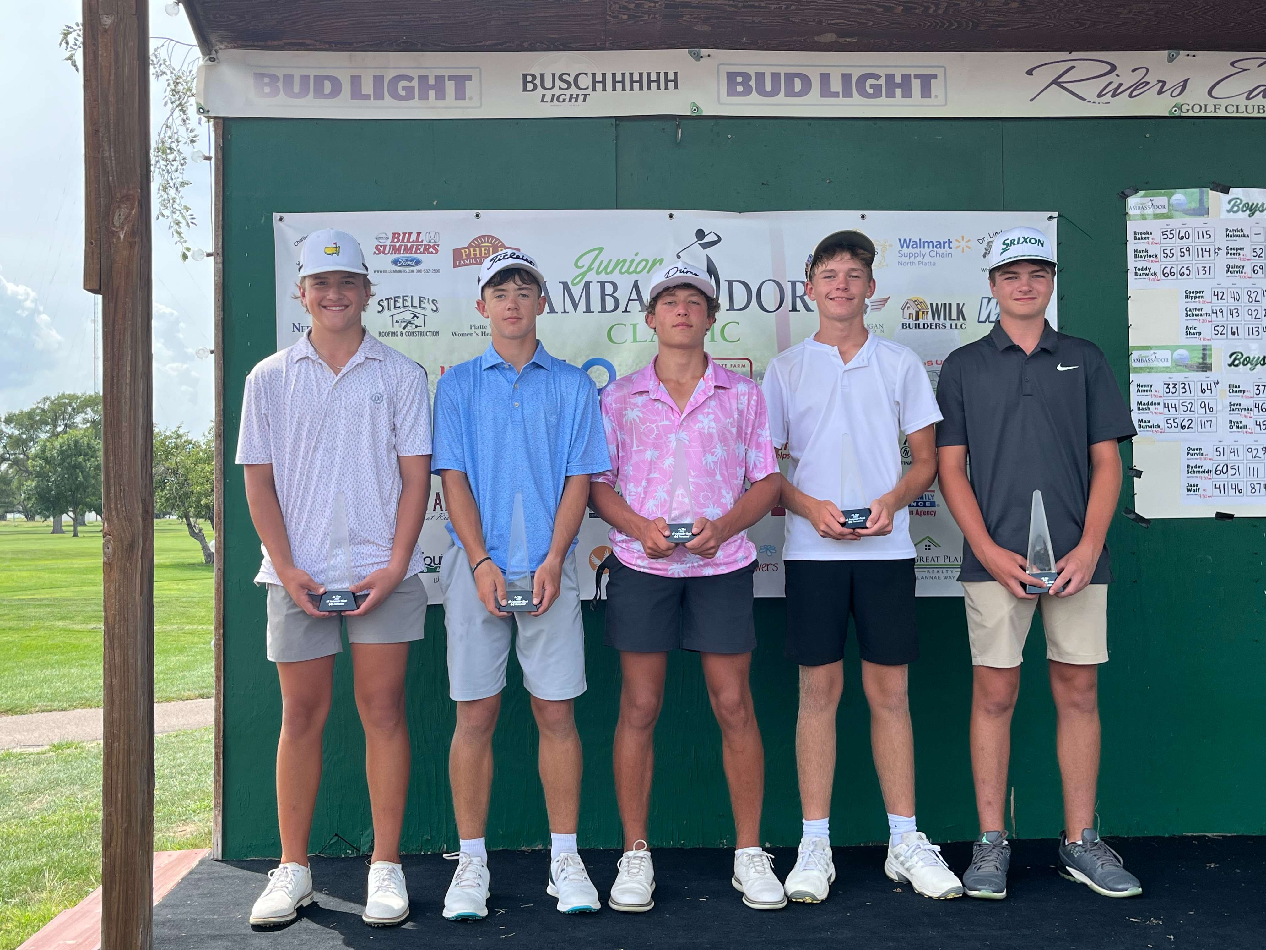 Winners of the Boys 14-15 flight stand on the stage Tuesday following the final day of play at the 2025 Junior Ambassador Classic in North Platte. Pictured left to right are: Connor Bash, Kearney, (first); Ben Werner, Mullen, (second); Jaylen Cummings, North Platte (third); Keaton Loop, McCook, (tie for fourth) and Lawson Cochran, Kearney, (tie for fourth).