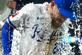 Kansas City Royals' Kyle Isbel is doused by teammates after their baseball game against the Atlanta Braves, Tuesday, July 29, 2025, in Kansas City, Mo. (AP Photo/Charlie Riedel)
