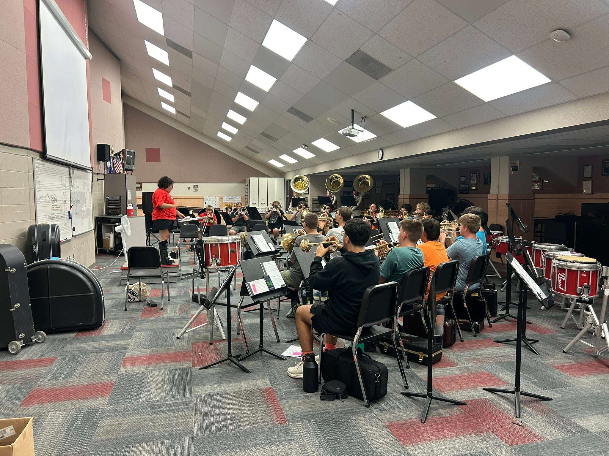 GBHS Band Director Ellie White leads students through a rehearsal in the band room during band camp, bringing energy and focus to the start of a new school year.