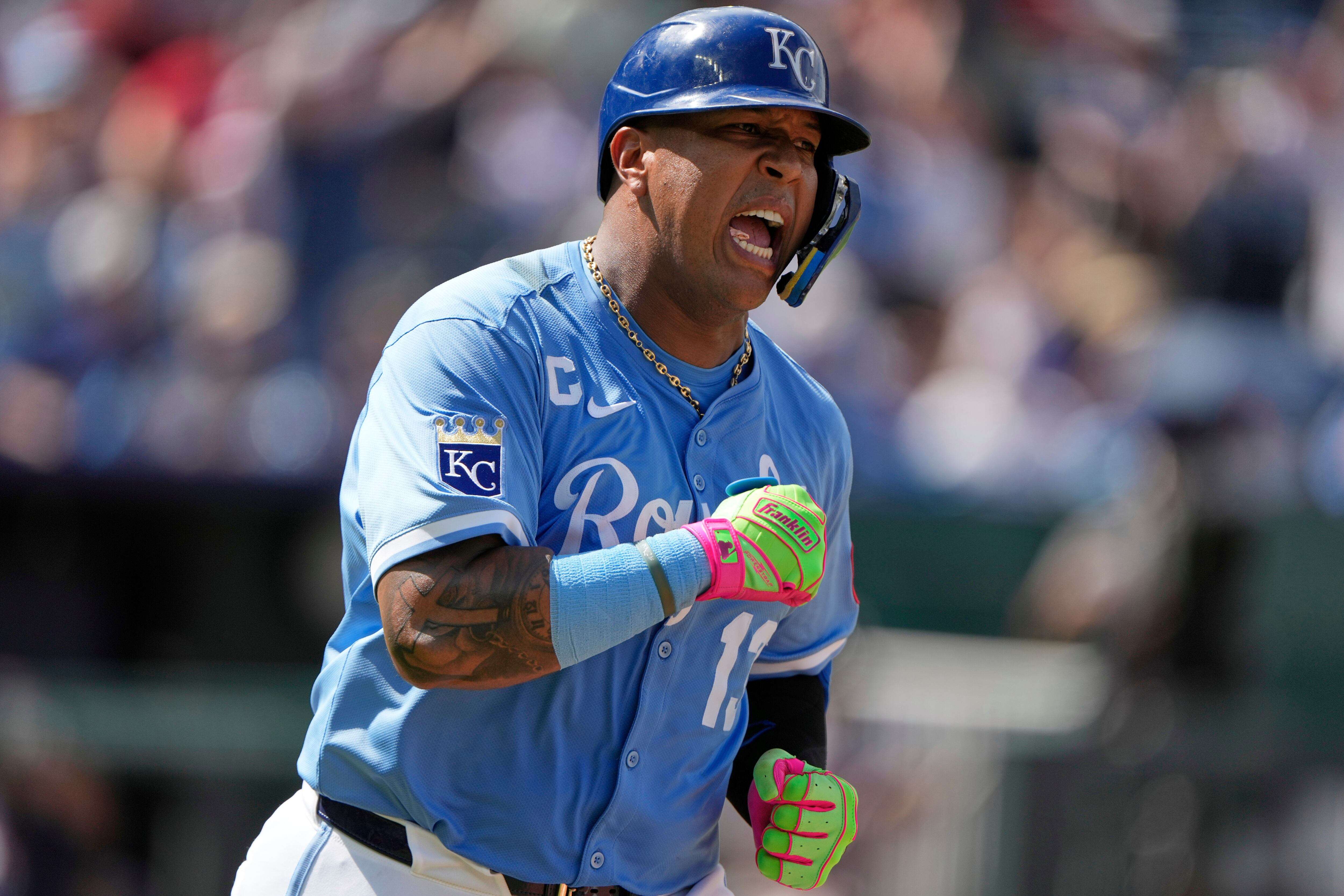 Kansas City Royals' Salvador Perez celebrates as he runs to first after hitting an RBI single to win the baseball game during the 10th inning against the Atlanta Braves, Wednesday, July 30, 2025, in Kansas City, Mo. (AP Photo/Charlie Riedel)