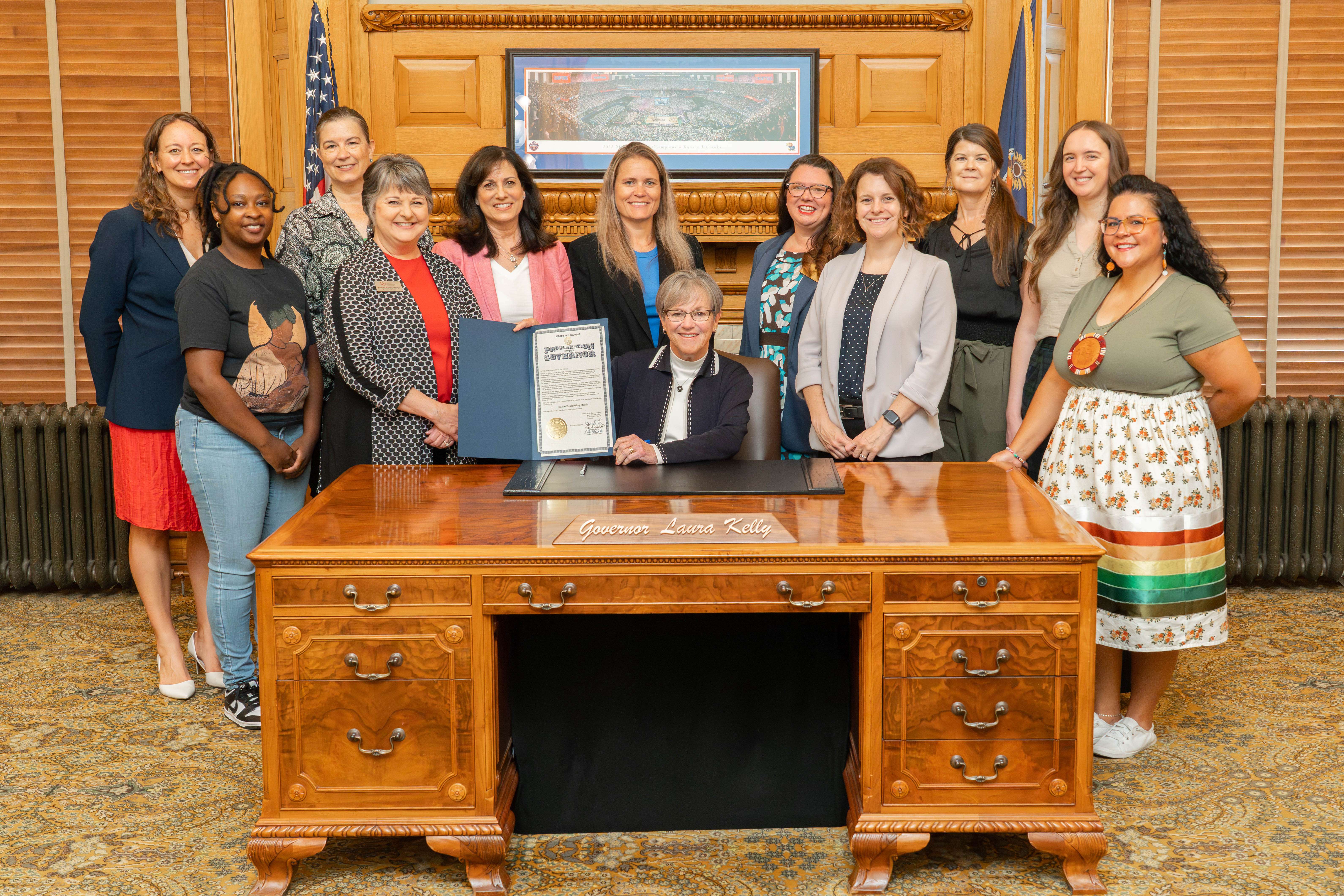 Proclamation Signing 2025 Photo (left to right) Dr. Kourtney Bettinger, Abriona Markham, Kari Bruffett, Brenda Bandy, Melissa Rooker, Amy Dean Campmire, Emily Barnes, Jackie Biggs, Kelly Marks, Casey Florea, and Stephanne Rupnicki; photo courtesy of <i>Kansas Department of Health and Environment (KDHE)</i>