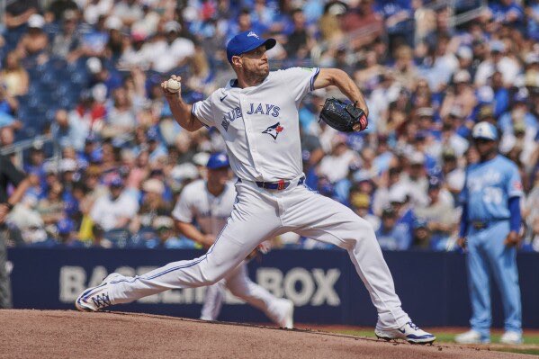 Toronto Blue Jays pitcher Max Scherzer (31) throws against the Kansas City Royals during first inning MLB baseball action in Toronto, on Saturday, Aug. 2, 2025. (Sammy Kogan/The Canadian Press via AP)