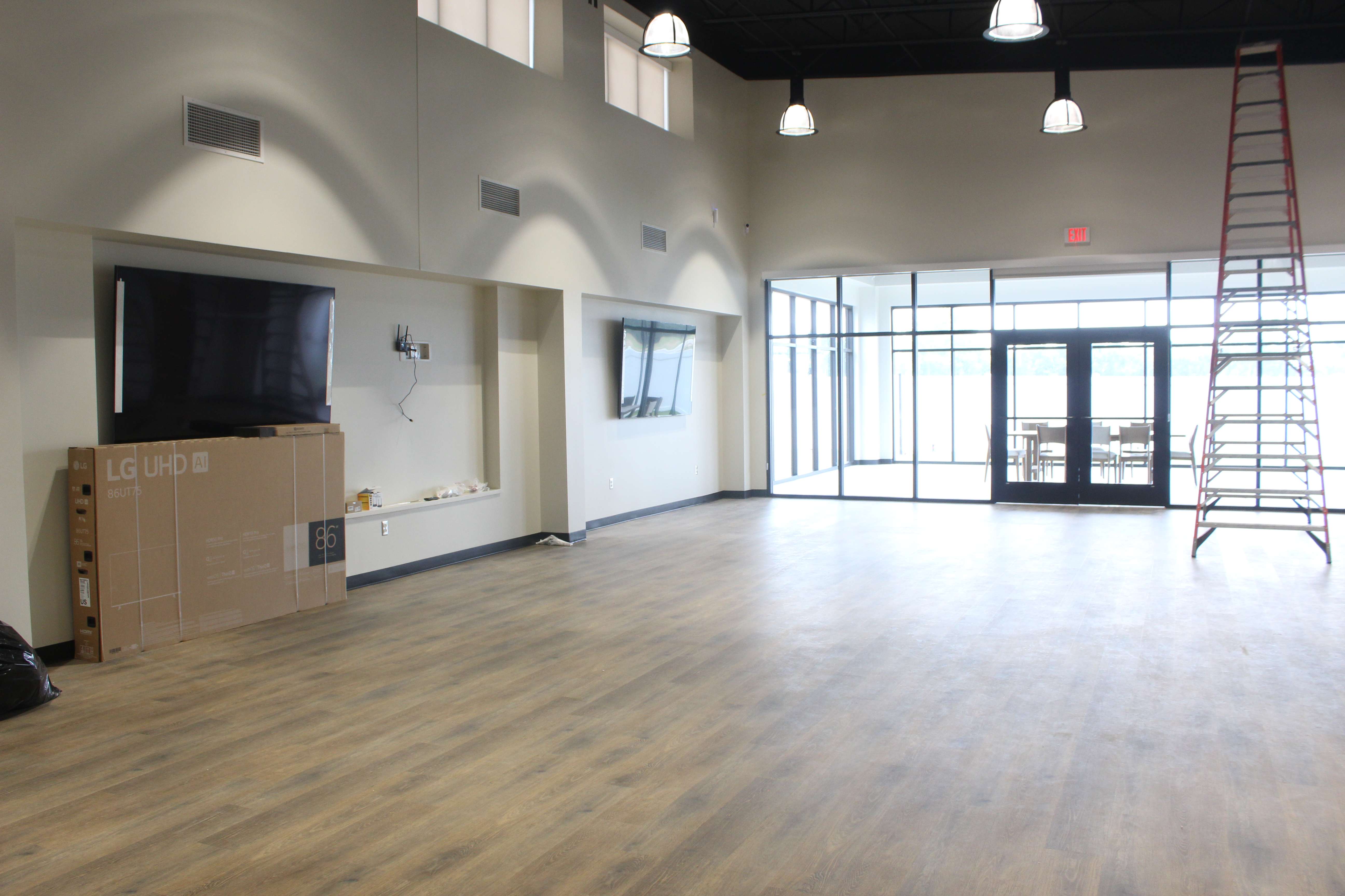 The community room in the new Bob and Pat Schmidt Community Center. This large open room is available to rent through Grow Hays. It has multiple TVs for presentations.&nbsp;Photo by Cristina Janney/Hays Post