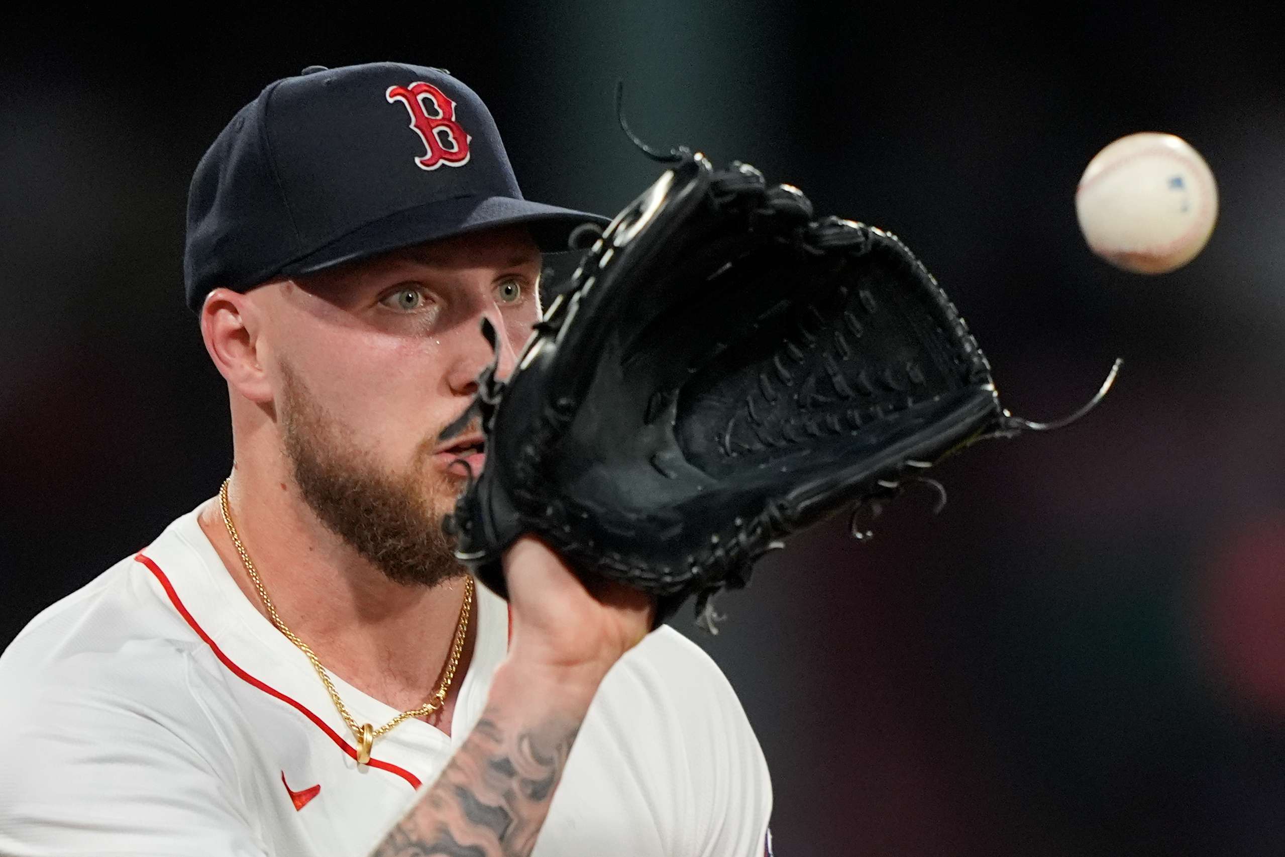 Boston Red Sox starting pitcher Garrett Crochet covers first base on a throw by first baseman Abraham Toro to make the out on Kansas City Royals Vinnie Pasquantino in the sixth inning, Tuesday, Aug. 5, 2025, in Boston. (AP Photo/Robert F. Bukaty)