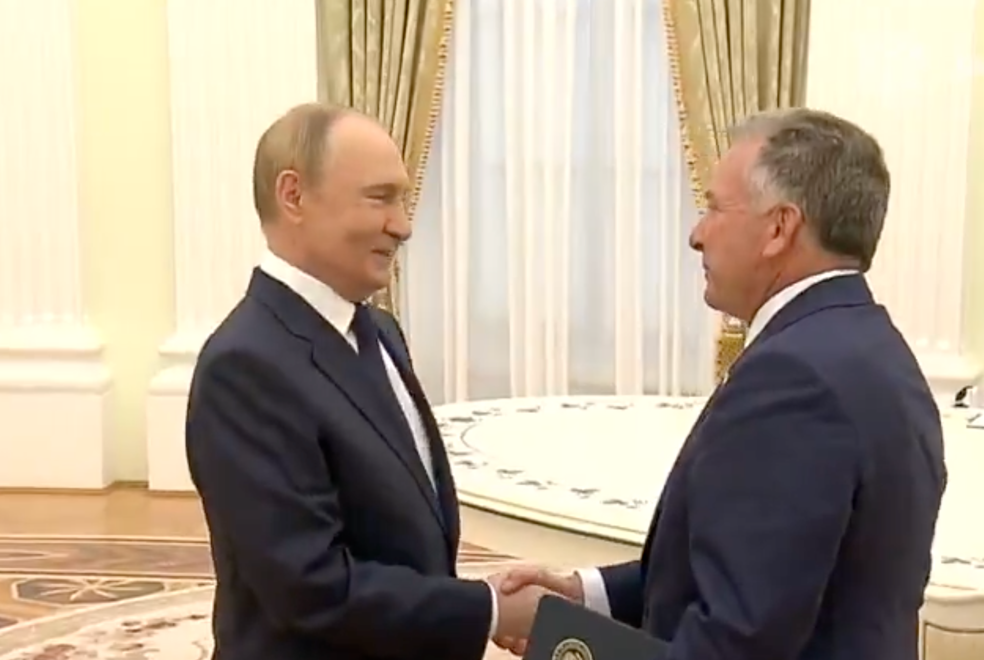 Russian President Vladimir Putin, left, and U.S. President Donald Trump's special envoy Steve Witkoff, right, shake hands during their meeting at the Kremlin in Moscow, Russia, Wednesday, Aug. 6, 2025. (Gavriil Grigorov, Sputnik, Kremlin Pool Photo via AP)