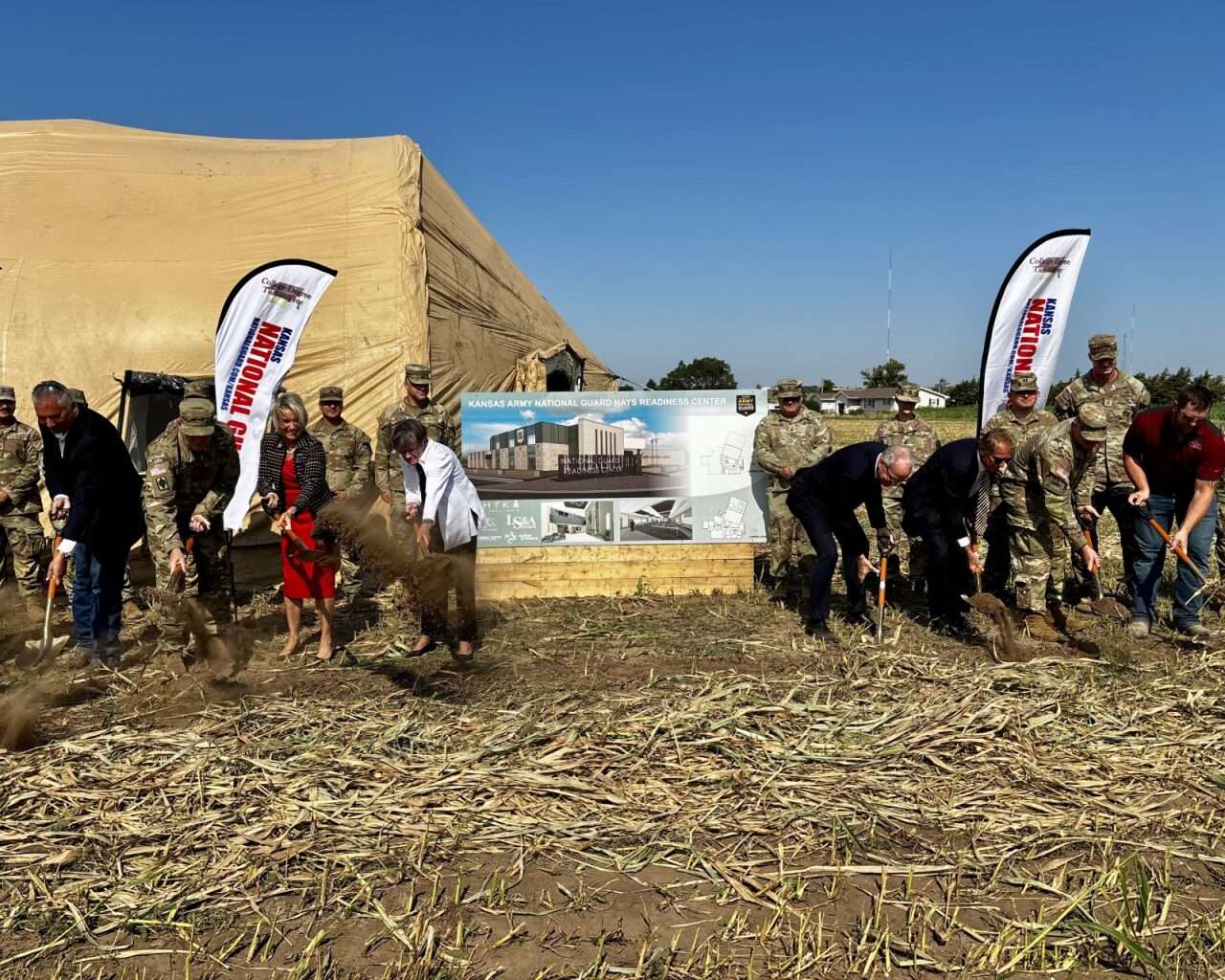 Gov. Laura Kelly with several other officials and Kansas National Guard soldiers in the turning of the soil ceremony for a new readiness center in Hays. Photo by Tony Guerrero/Hays Post