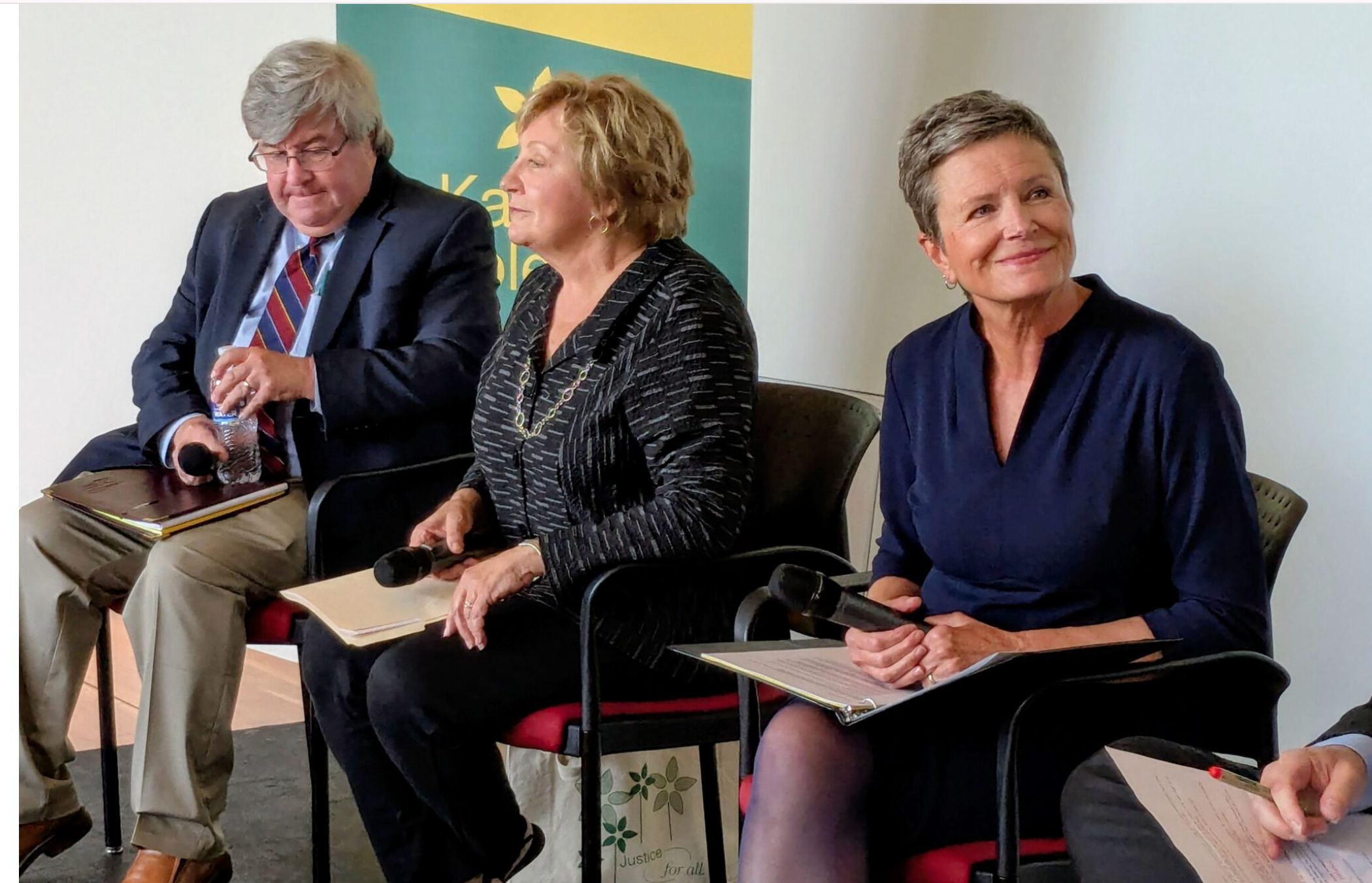  From left, Mark Tallman of the Kansas Association of School Boards, Teresa Woody, litigation director of Kansas Appleseed, and retired Kansas Supreme Court Justice Carol Beier participate in a panel discussion Wednesday at the University of Kansas on a proposed amendment to the Kansas Constitution to allow direct election of Supreme Court justices. (Tim Carpenter/Kansas Reflector)