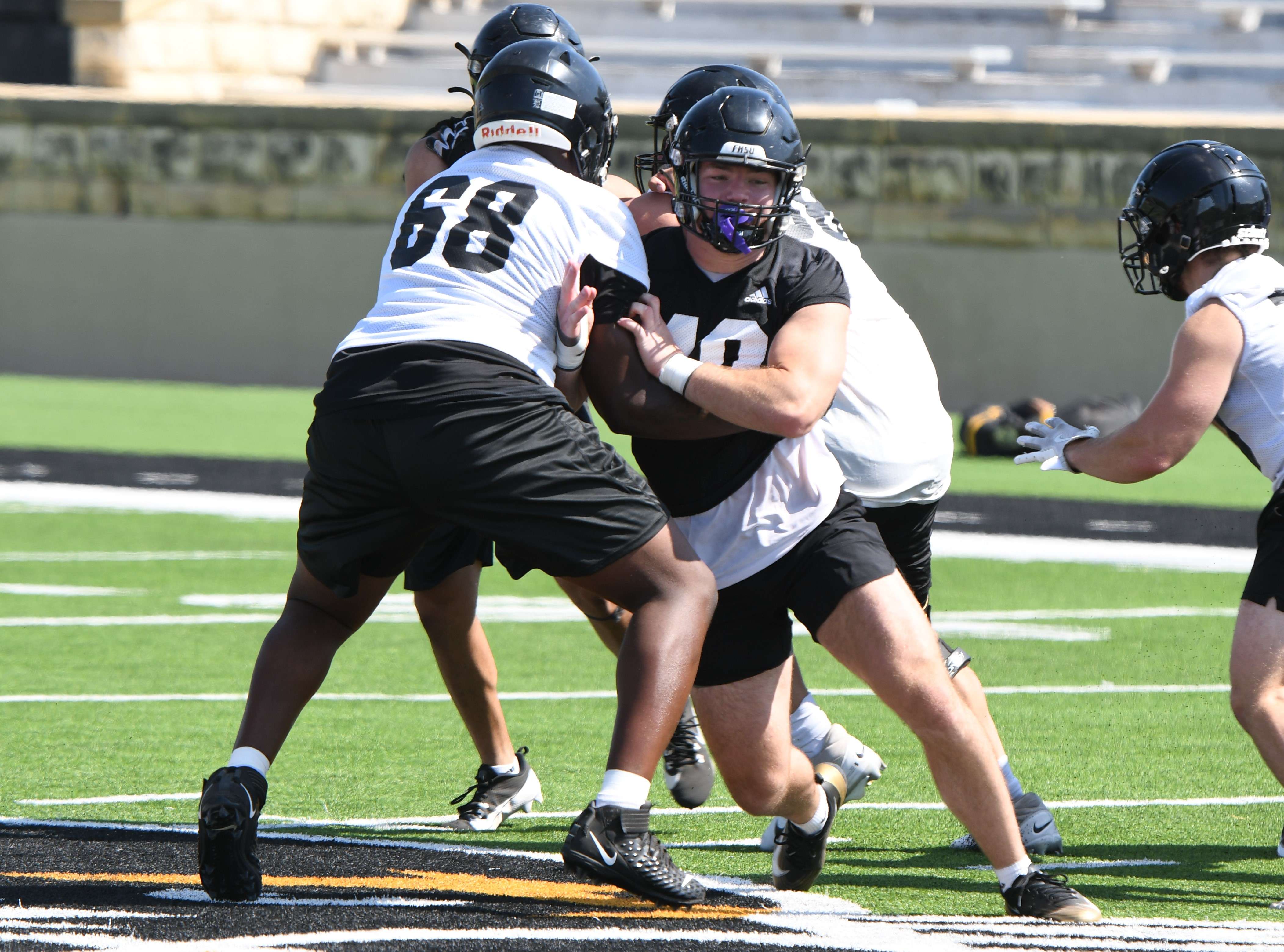 Fort Hays State linebacker Gavin Meyers (40) fights off a block during preseason camp at Lewis Field in Hays, Kan. (FHSU Athletics photo/Ryan Prickett)
