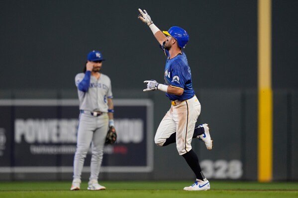 Minnesota Twins' Kody Clemens, right, runs the bases after hitting a solo home run during the fourth inning of a baseball game against the Kansas City Royals, Friday, Aug. 8, 2025, in Minneapolis. (AP Photo/Abbie Parr)