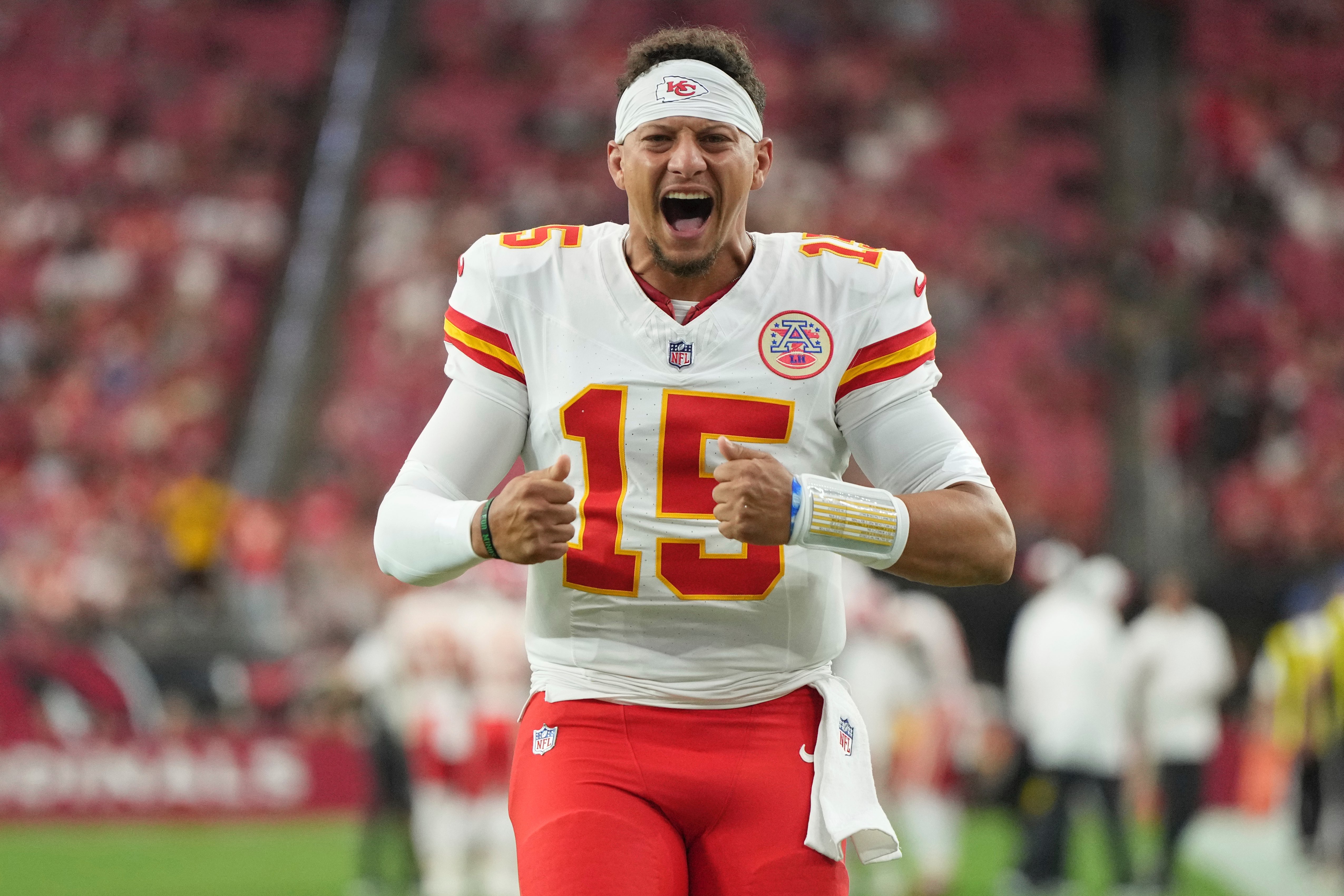 Kansas City Chiefs quarterback Patrick Mahomes (15) yells prior to an NFL preseason football game against the Arizona Cardinals, Saturday, Aug. 9, 2025, in Glendale. (AP Photo/Rick Scuteri)