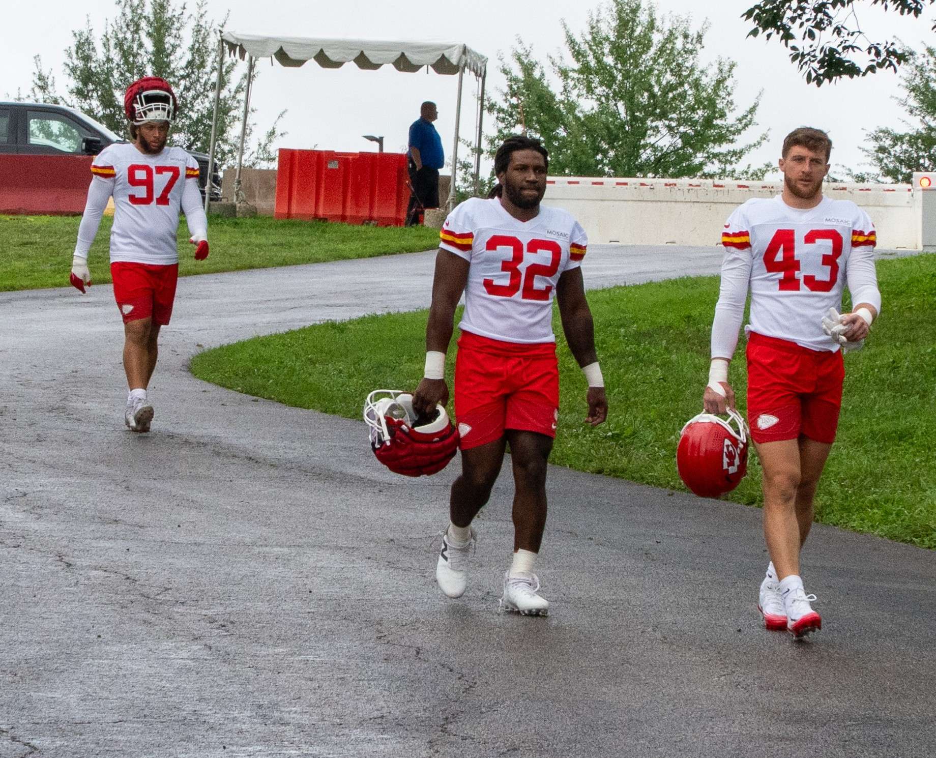 Nick Bolton (32) walks to practice during Chiefs Training Camp alongside linebacker Jack Cochrane (43) / Photo by Justin Peacock