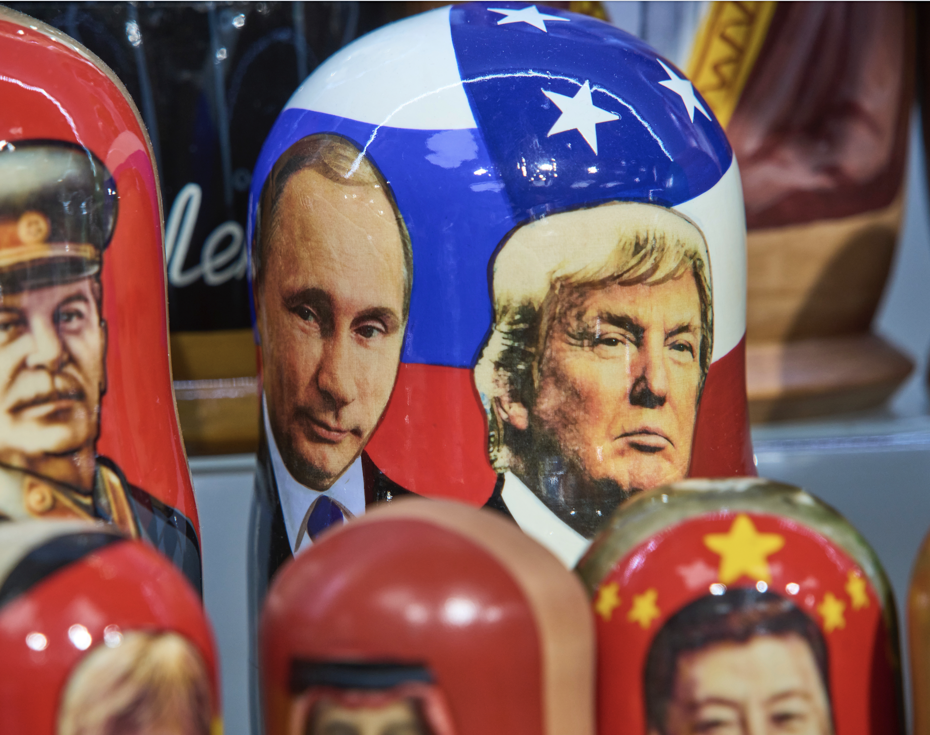 Traditional Russian wooden dolls called Matryoshka depicting Soviet Leader Josef Stalin, left, Russian President Vladimir Putin, center, and U.S. President Donald Trump are displayed for sale at a souvenir shop in Moscow, Russia, Tuesday, Aug. 12, 2025. (AP Photo/Alexander Zemlianichenko)
