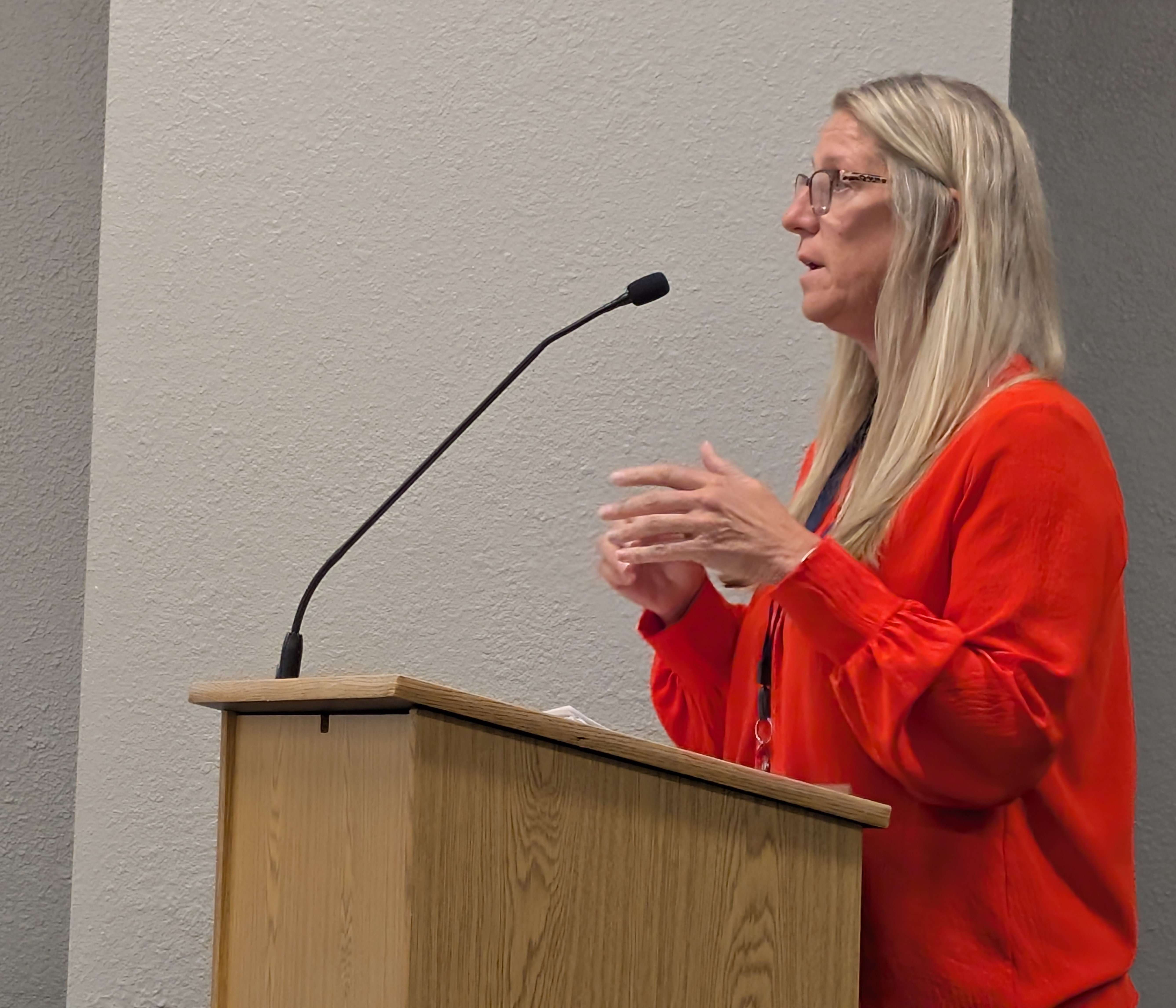Juvenile Services Director Marissa Woodmansee presents her agency’s annual report to the Barton County Commission Tuesday morning.