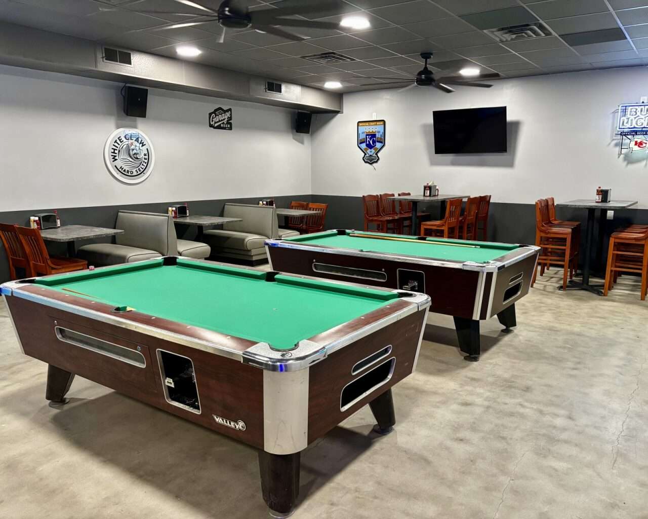 Pool tables and more seating in another area of Storytellers in Hays. Photo by Tony Guerrero/Hays Post