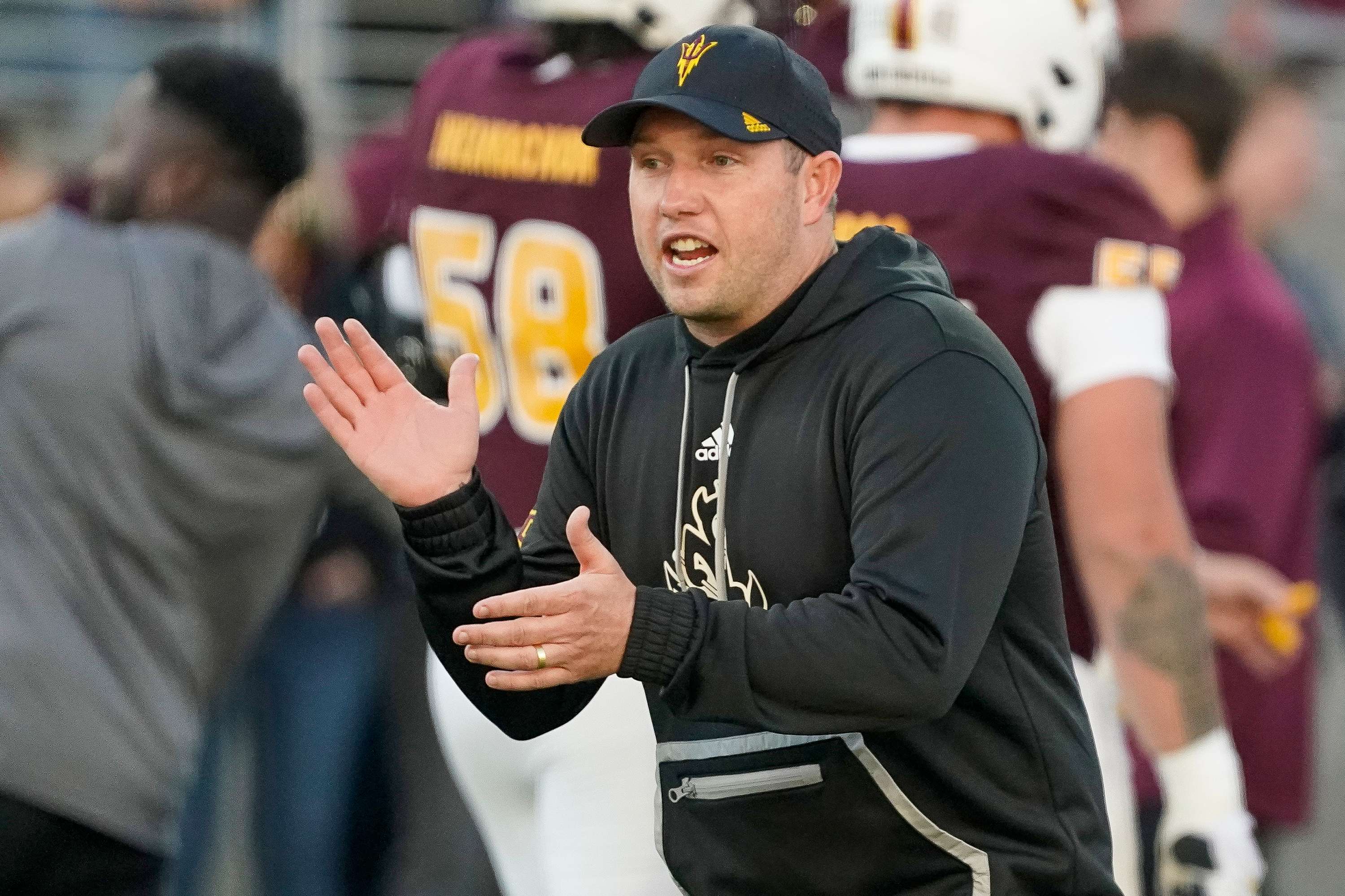 FILE - Arizona State head coach Kenny Dillingham applauds his players during a NCAA college football game against Central Florida Saturday, Nov. 9, 2024, in Tempe, Ariz. (AP Photo/Darryl Webb, File)