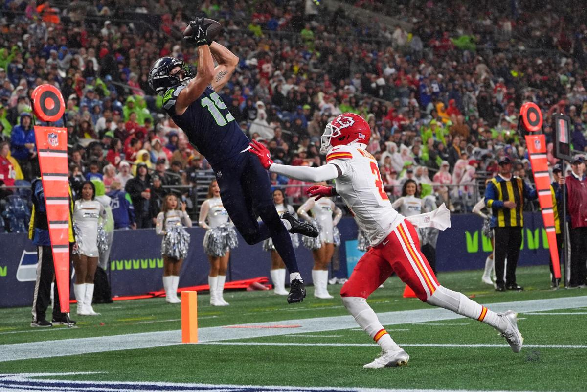 Seattle Seahawks wide receiver Jake Bobo (19) makes a touchdown catch as Kansas City Chiefs cornerback Joshua Williams (2) defends during the first half of an NFL preseason football game Friday, Aug. 15, 2025, in Seattle. (AP Photo/Lindsey Wasson)