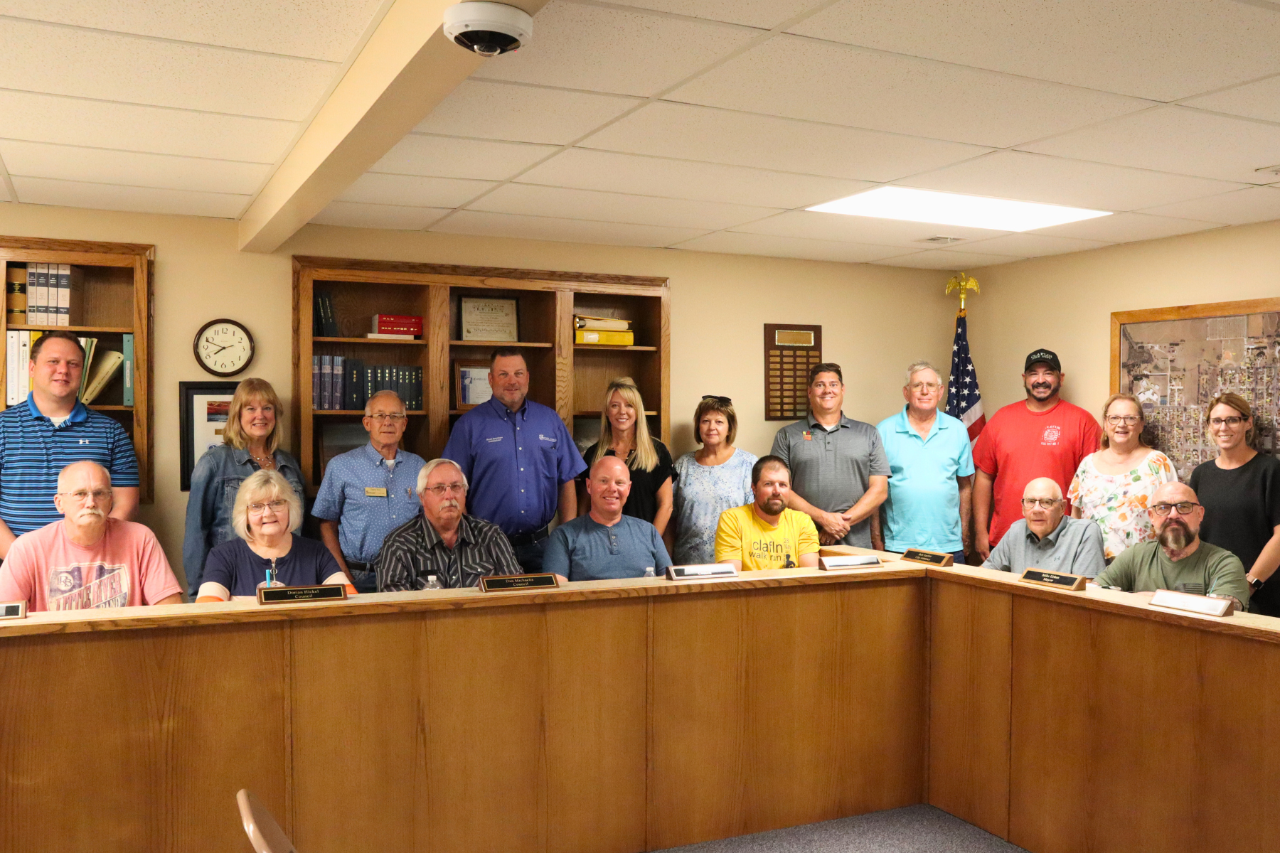 Pictured are members of the Barton County Commission and county administration, along with the Claflin City Council, city administrator, city attorney,&nbsp; mayor, and recipients of the Facade Improvement Grant.