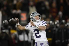 Kansas State quarterback Avery Johnson throws a pass during the first half of an NCAA college football game against Iowa State on Nov. 30, 2024, in Ames, Iowa. (AP Photo/Charlie Neibergall, File)