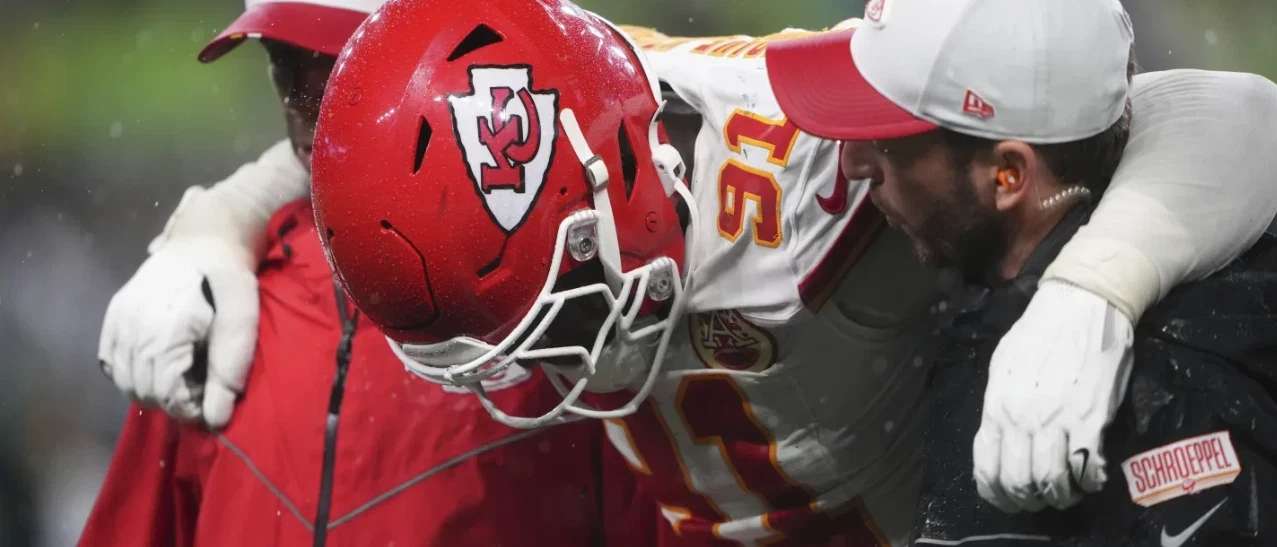 Kansas City Chiefs defensive end Felix Anudike-Uzomah (91) is helped off the field after a play during the second half of an NFL preseason football game against the Seattle Seahawks, Friday, Aug. 15, 2025, in Seattle. (AP Photo/Lindsey Wasson)