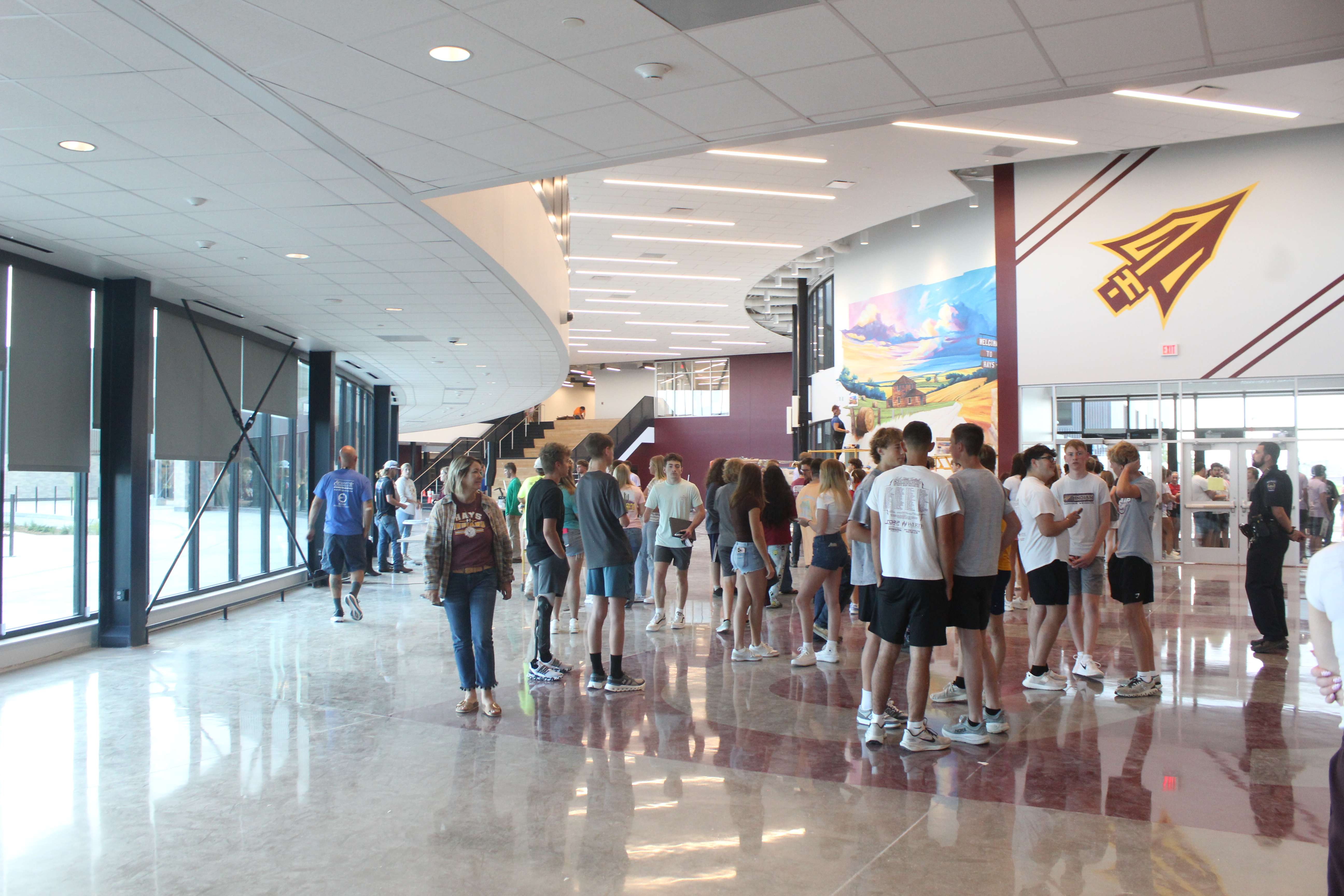 Juniors and seniors gathered for a sneak peek of the new Hays High School in the commons on Monday. Today is the first day of classes in the $100 million building that was paid for through a bond passed in 2022. Photo by Cristina Janney/Hays Post