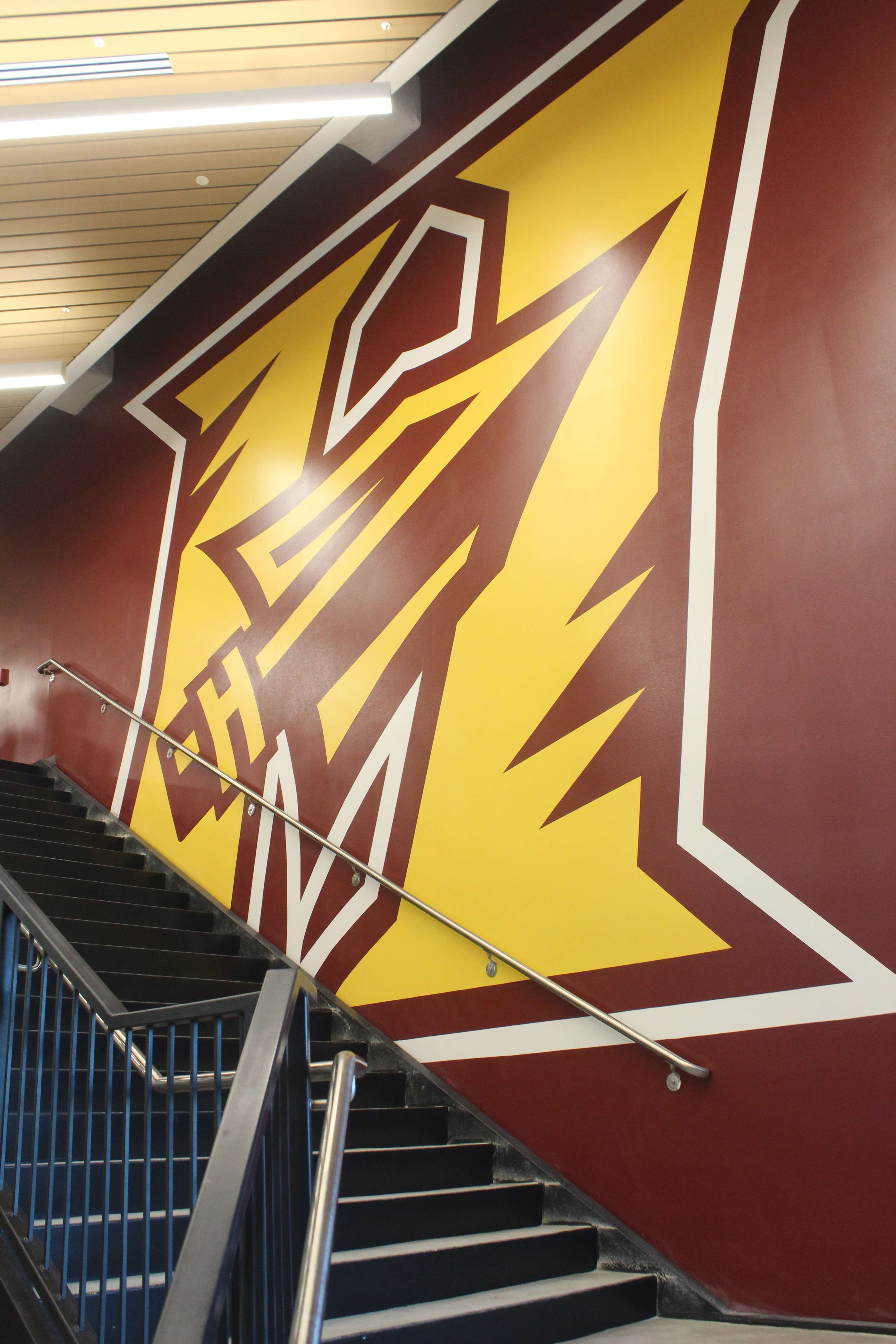The Hays High Indian logo in the stairwell of the athletics wing. Photo by Cristina Janney/Hays Post