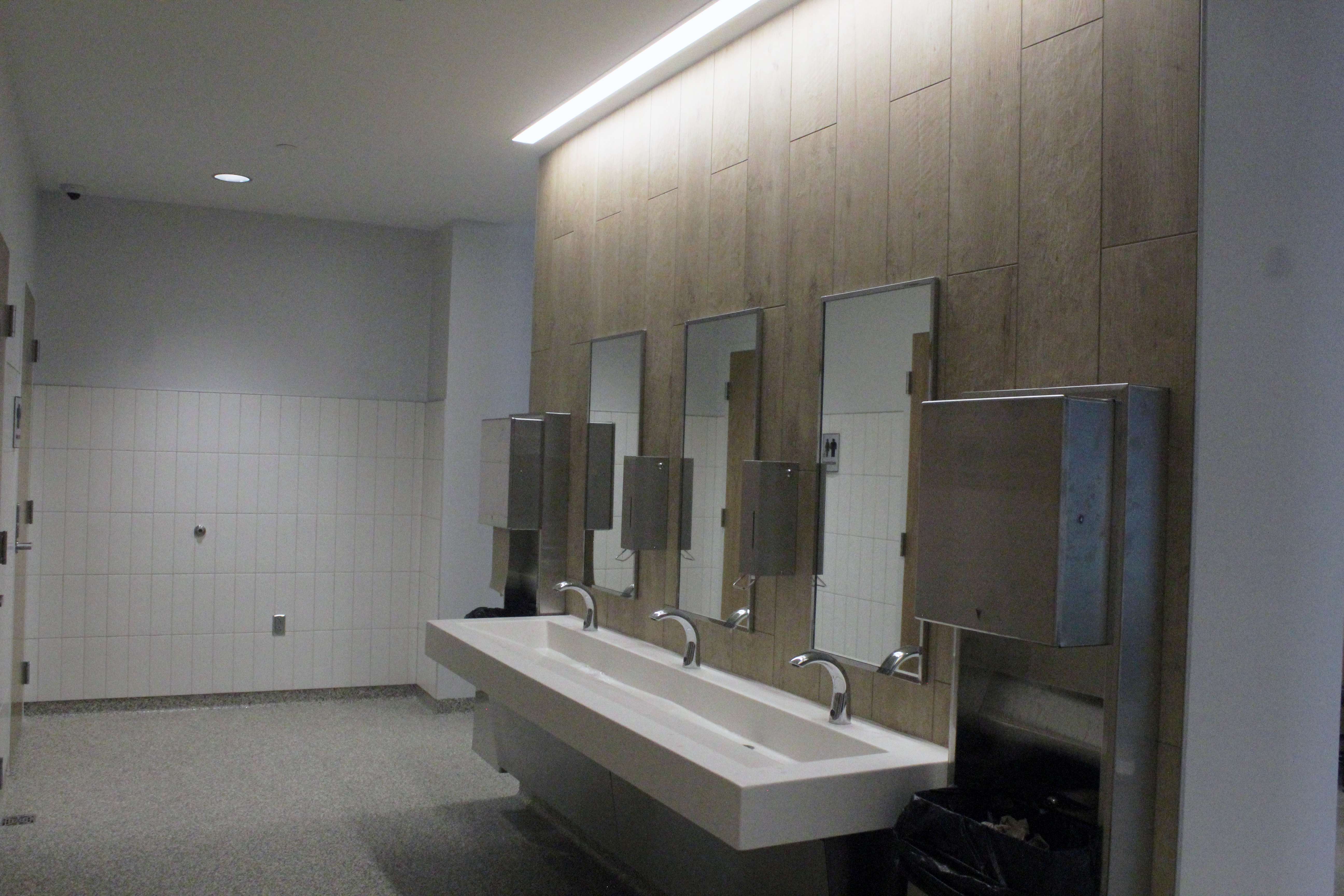 The private bathrooms have common sink areas. The entrances to the sinks are open to the halls. School administrators say this style of bathroom will provide more privacy for students and be easier for teachers and staff to monitor. However, a small group of residents has opposed this design throughout the project. Photo by Cristina Janney/Hays Post