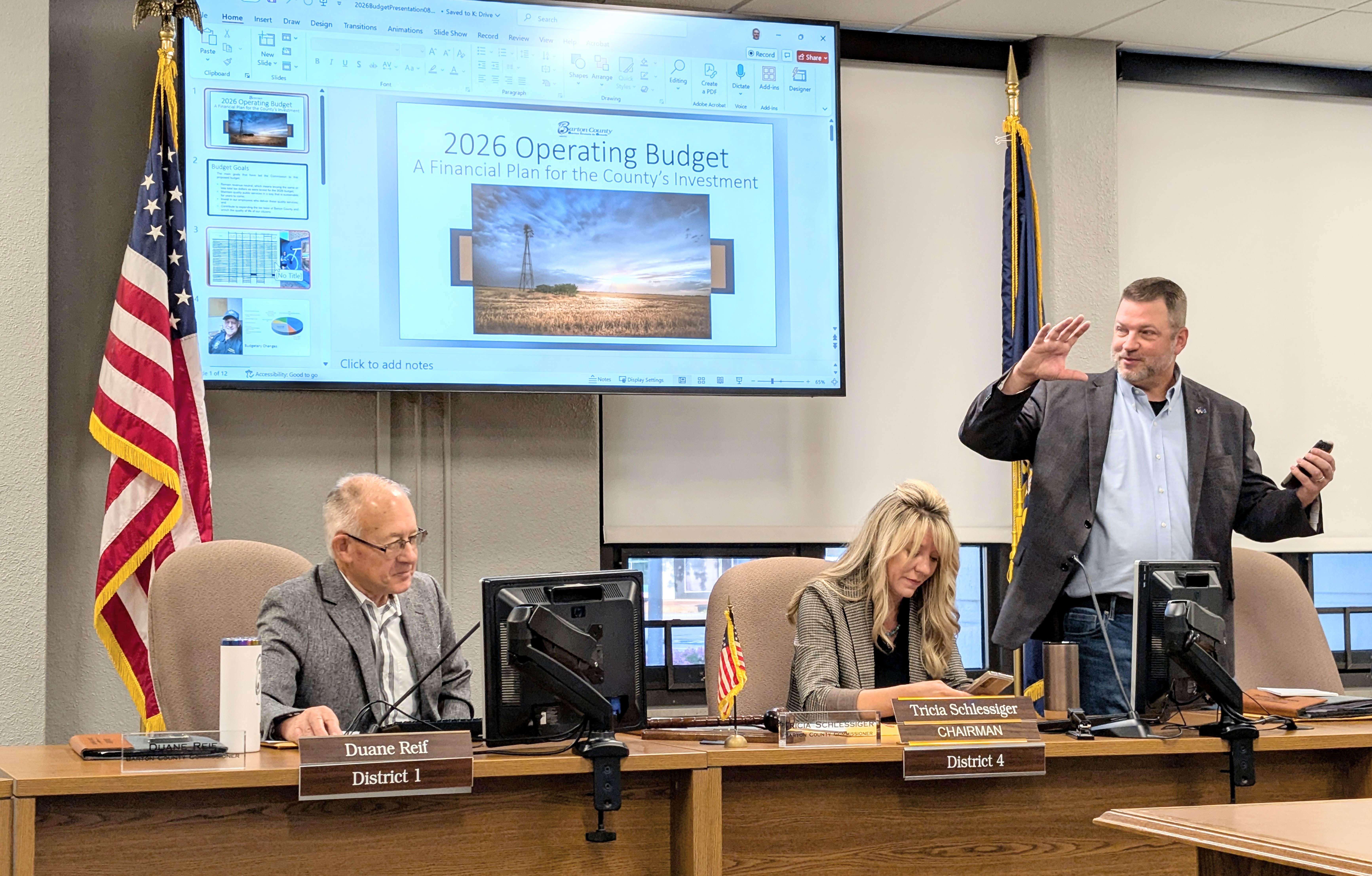 Barton County commissioners, left to right, Duane Reif, Tricia Schlessiger and Shawn Hutchinson discuss the county’s 2026 operating budget prior to the commission meeting Tuesday morning.