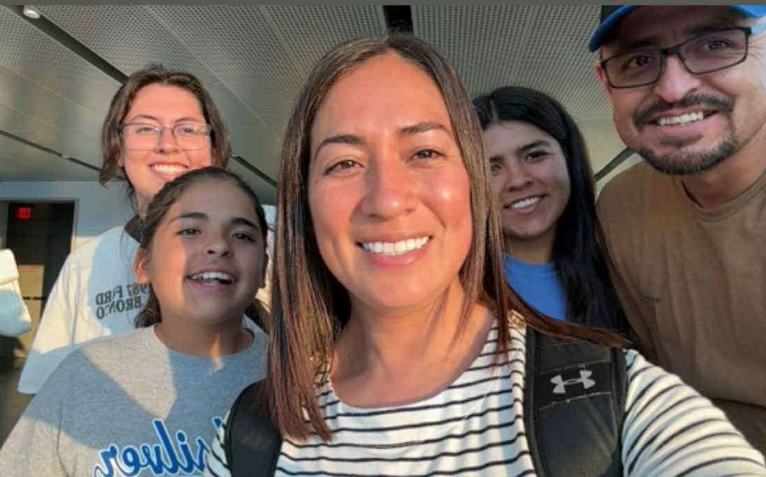 Adriana Arias with her husband, Jose, and three children.