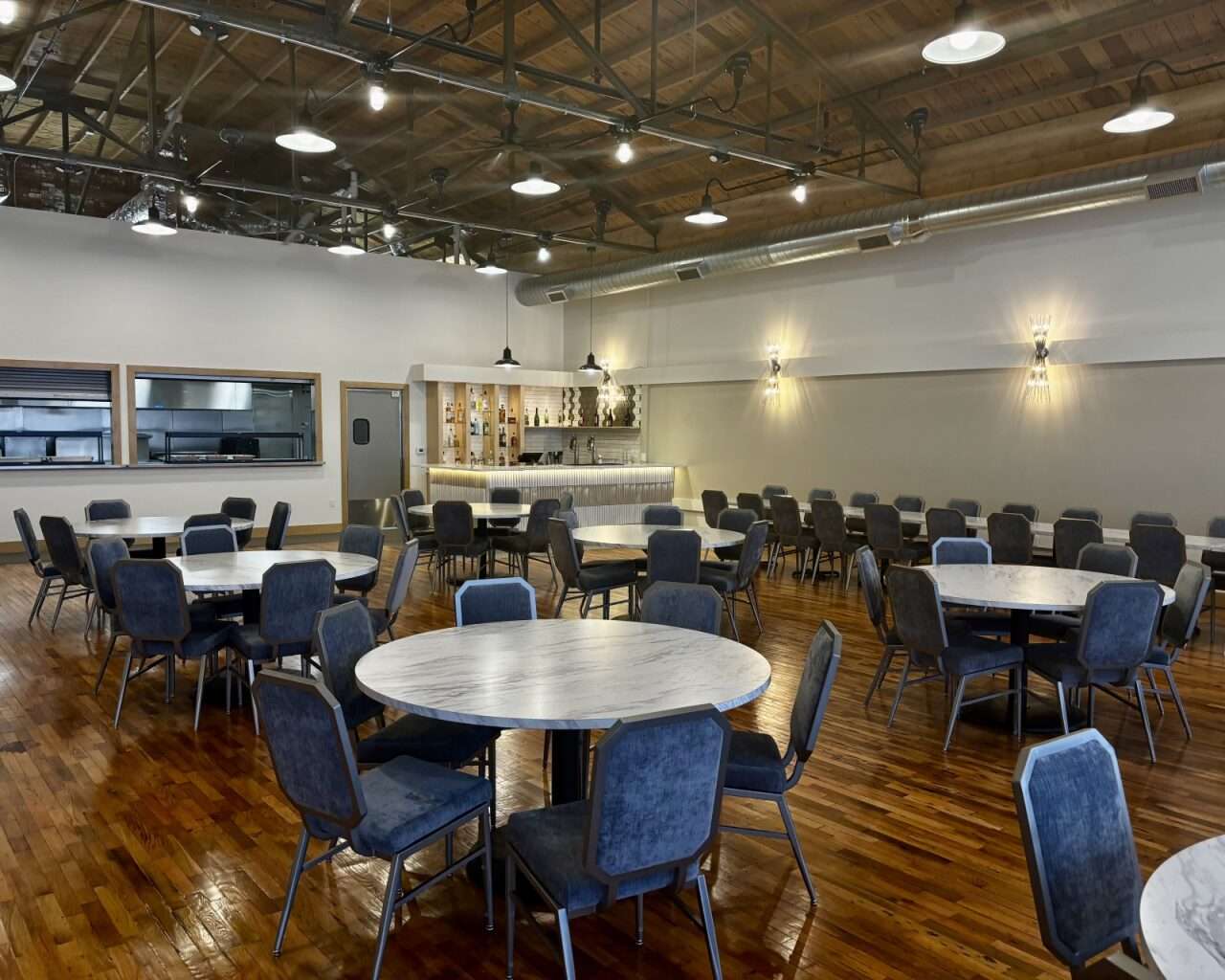 Chairs and tables at the event center next to Gella's Diner and LB Brewing in Hays. Photo by Tony Guerrero/Hays Post